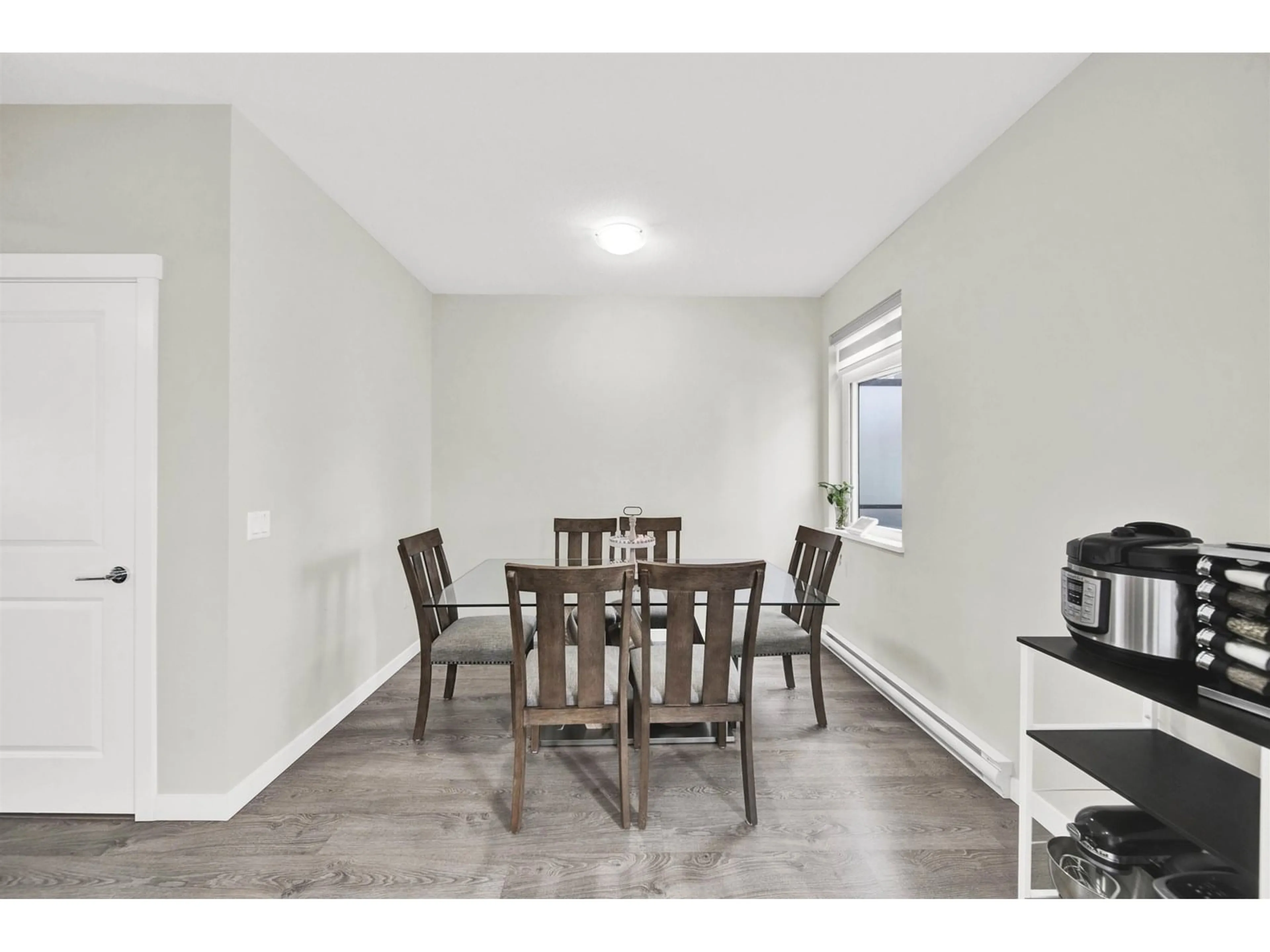 Dining room, wood/laminate floor for 147 - 15111 EDMUND, Surrey British Columbia V3S0A5