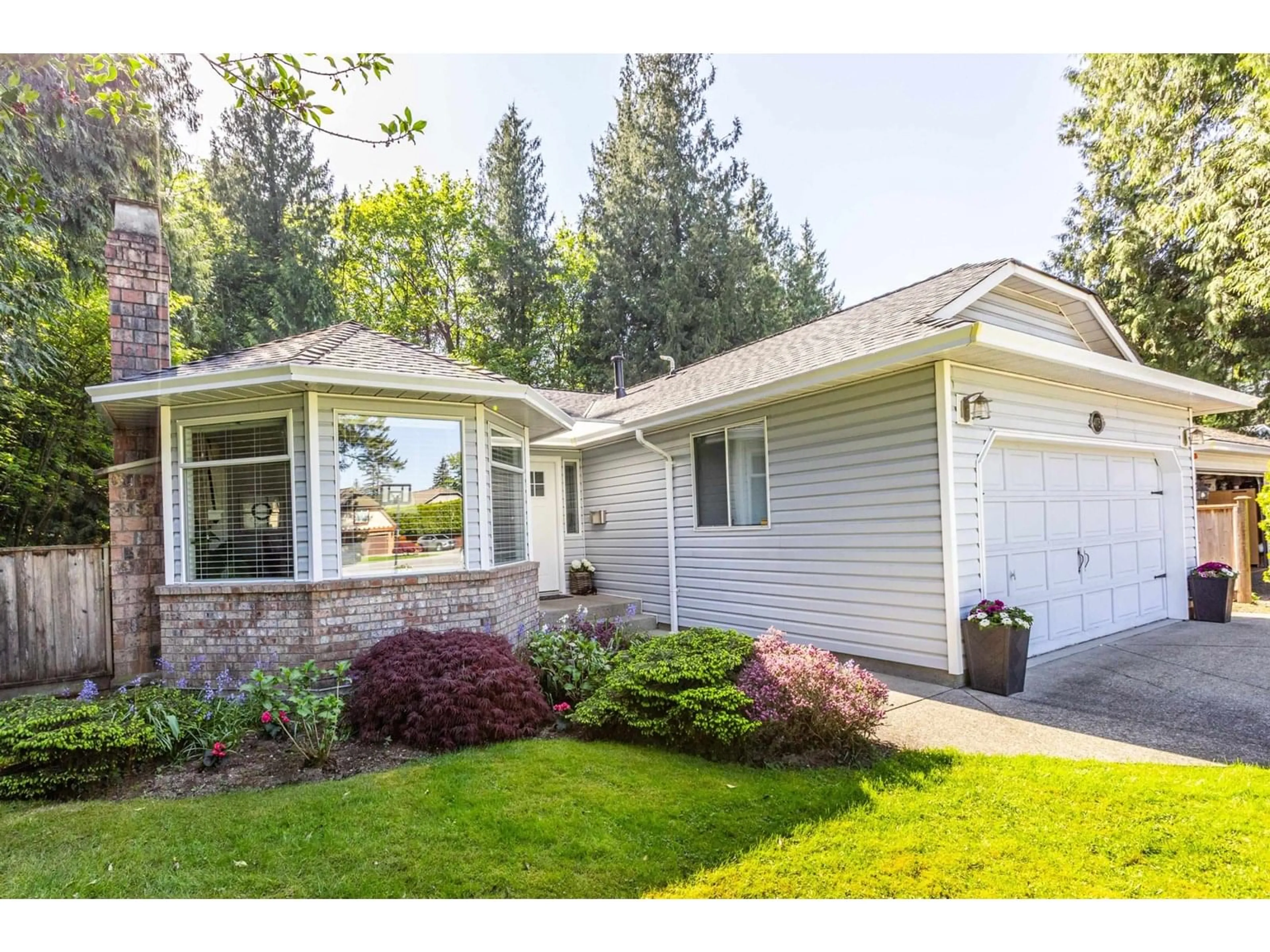 Home with vinyl exterior material, street for 4075 199A, Langley British Columbia V3A7S8