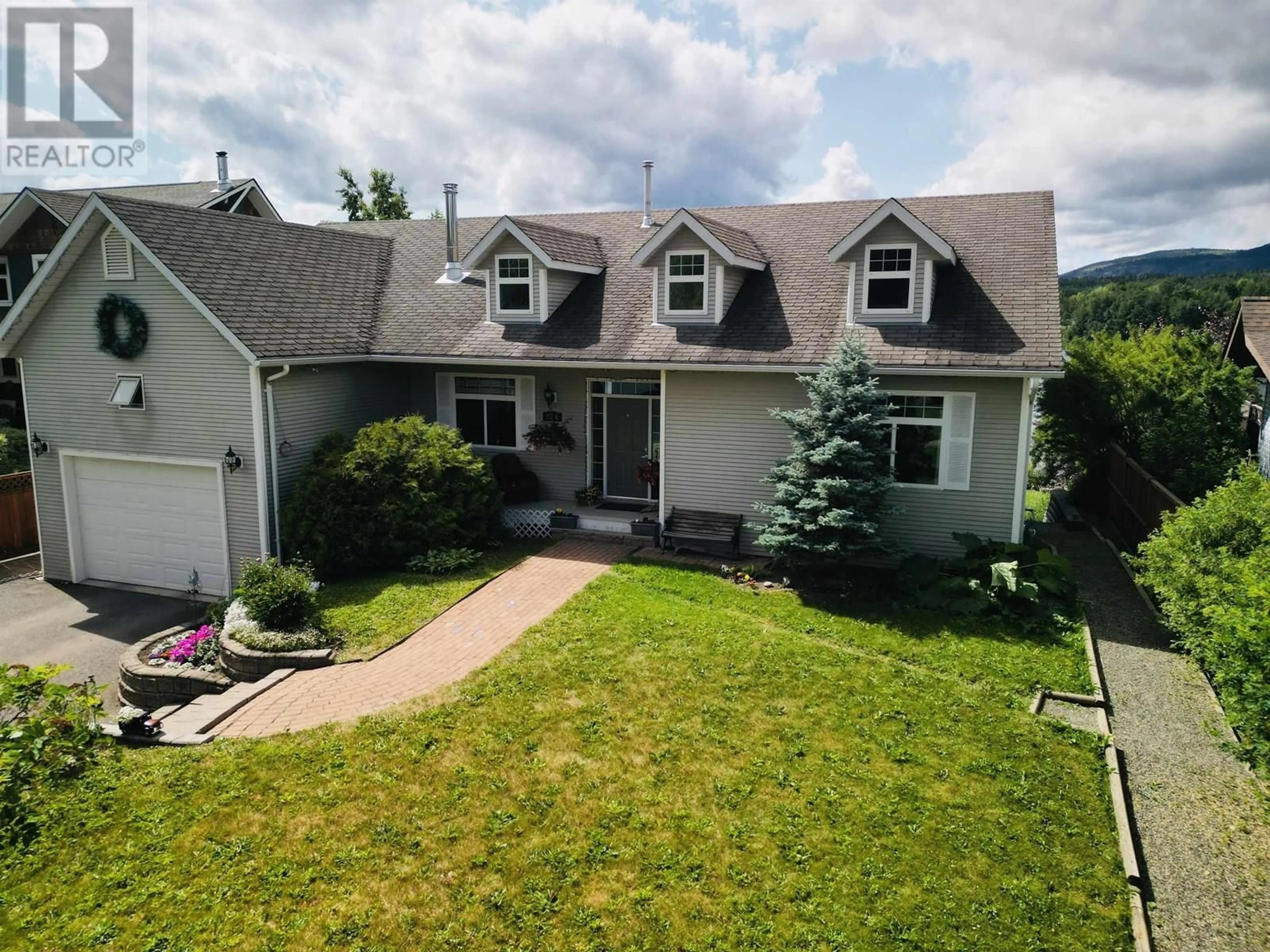 A pic from outside/outdoor area/front of a property/back of a property/a pic from drone, mountain view for 286 PIONEER WAY, Burns Lake British Columbia V0J1E0