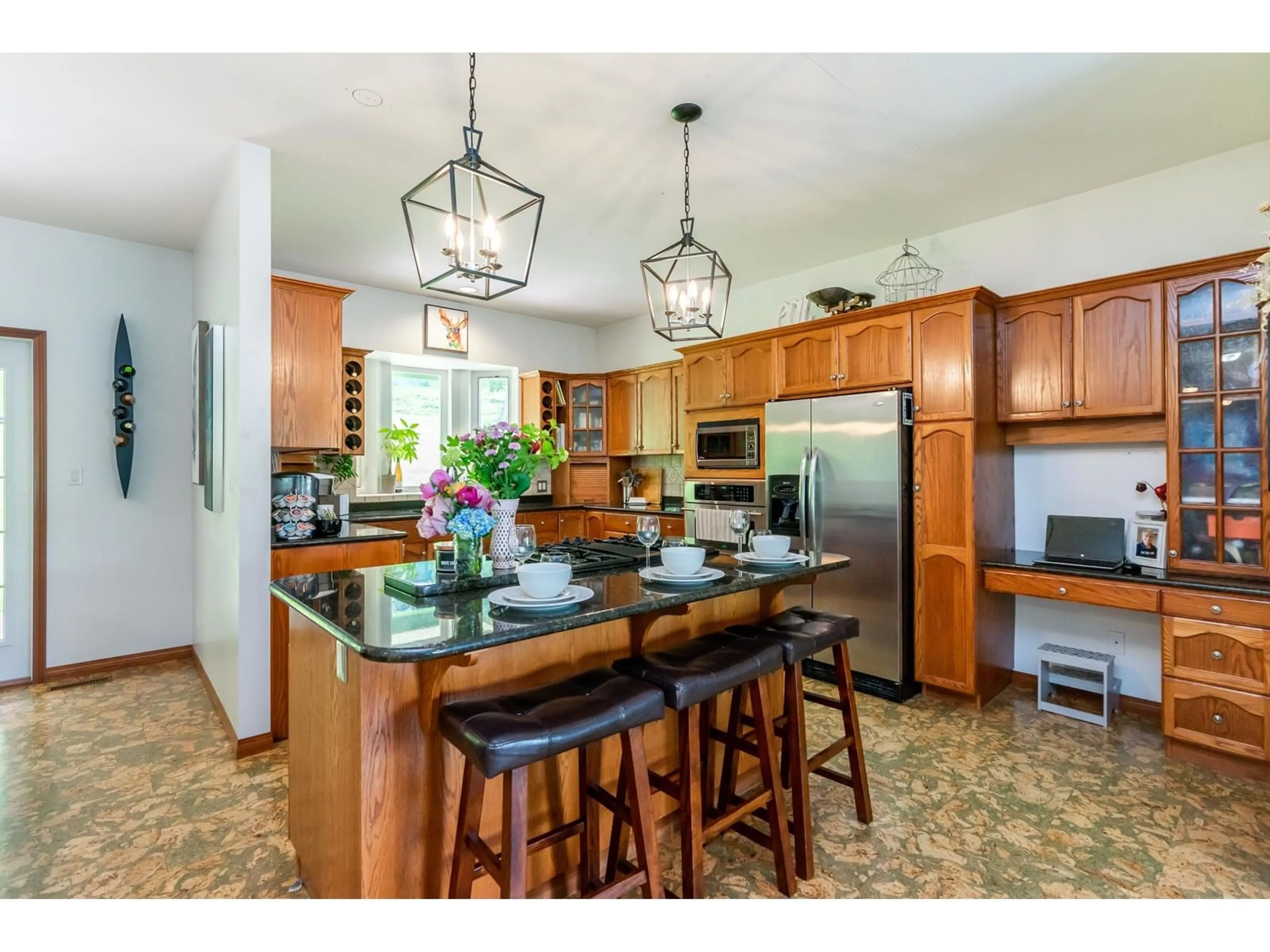 Open concept kitchen, ceramic/tile floor for 42160 MAJUBA HILL ROAD, Yarrow British Columbia V2R5H2