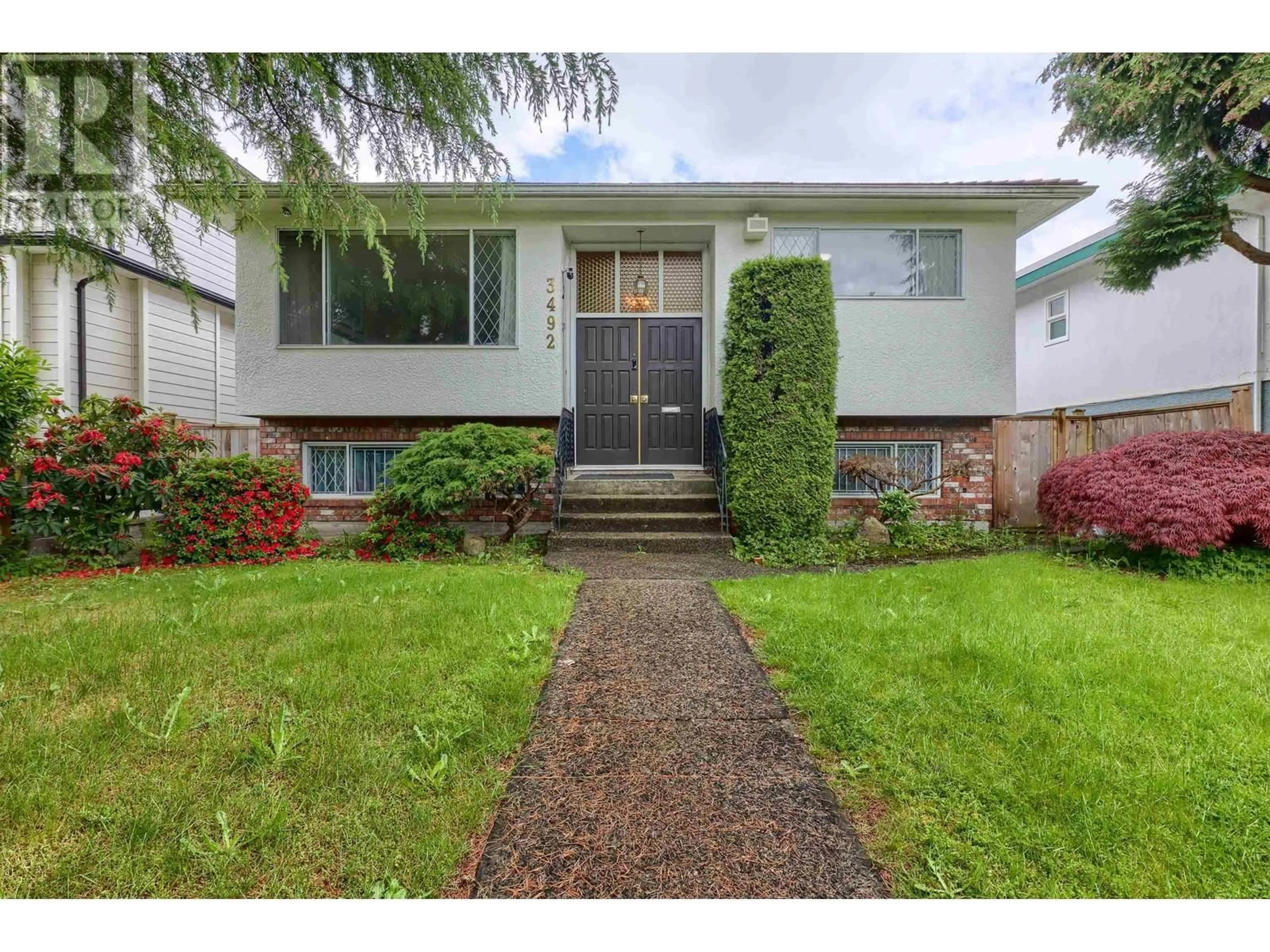 Home with vinyl exterior material, street for 3492 49TH AVENUE, Vancouver British Columbia V5S1M2