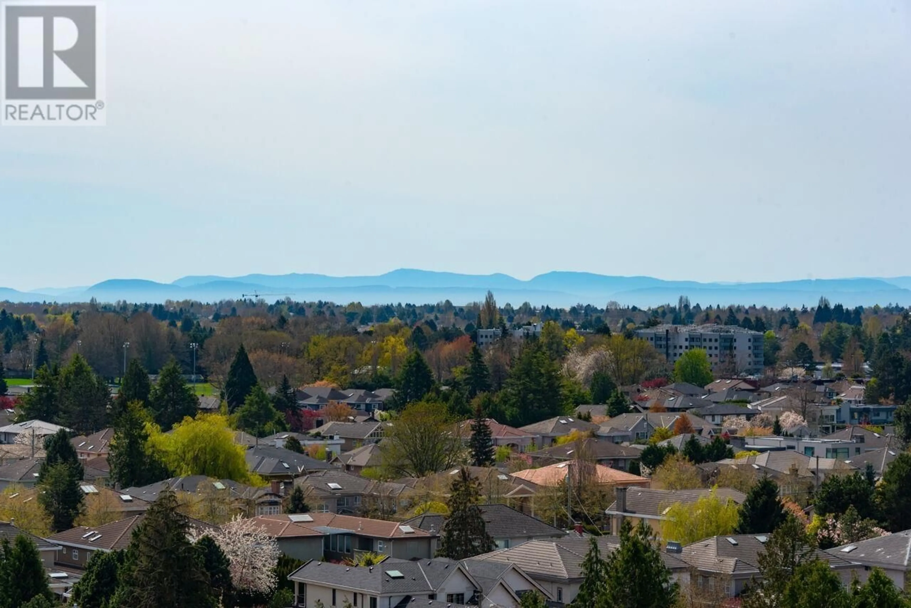 A pic from outside/outdoor area/front of a property/back of a property/a pic from drone, mountain view for 1201 - 7100 GILBERT ROAD, Richmond British Columbia V7C5C3