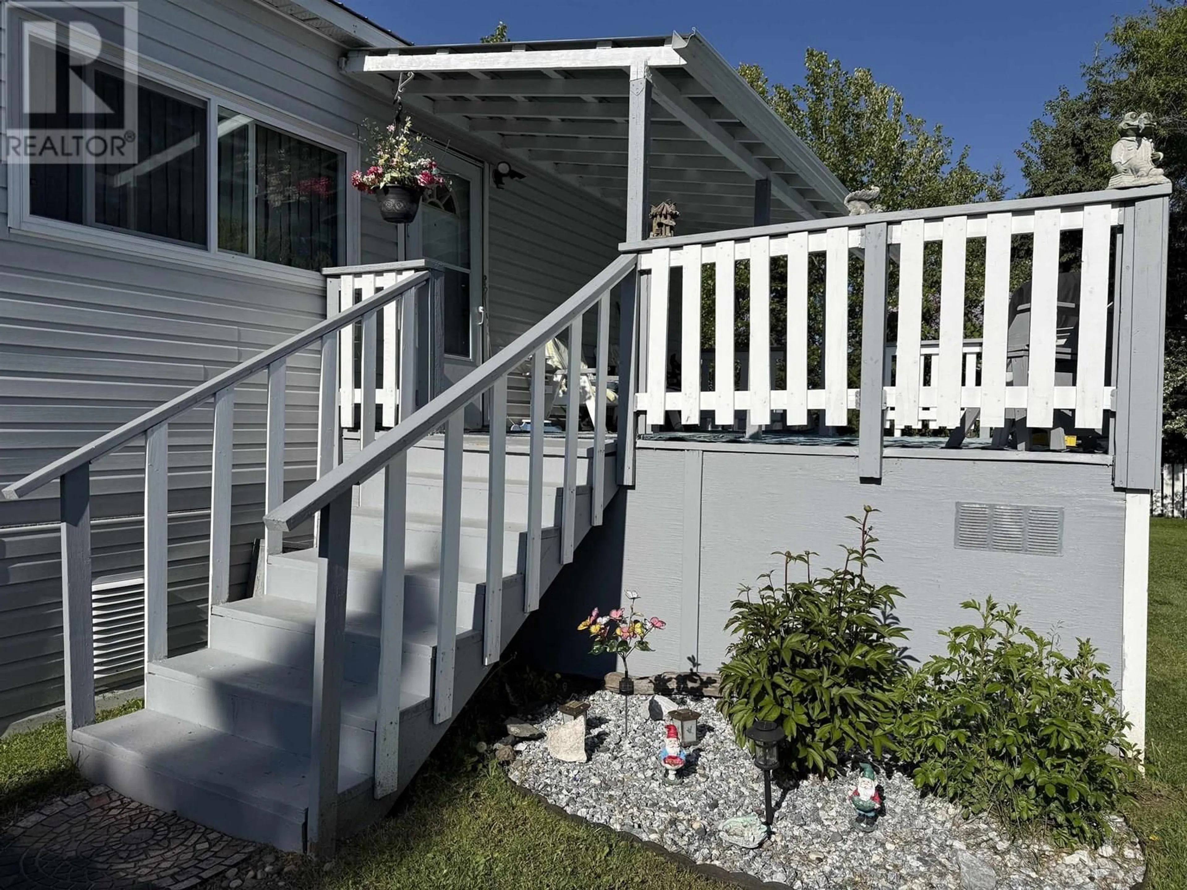 Home with vinyl exterior material, street for 1854 SOMMERVILLE ROAD, Prince George British Columbia V2N6T5