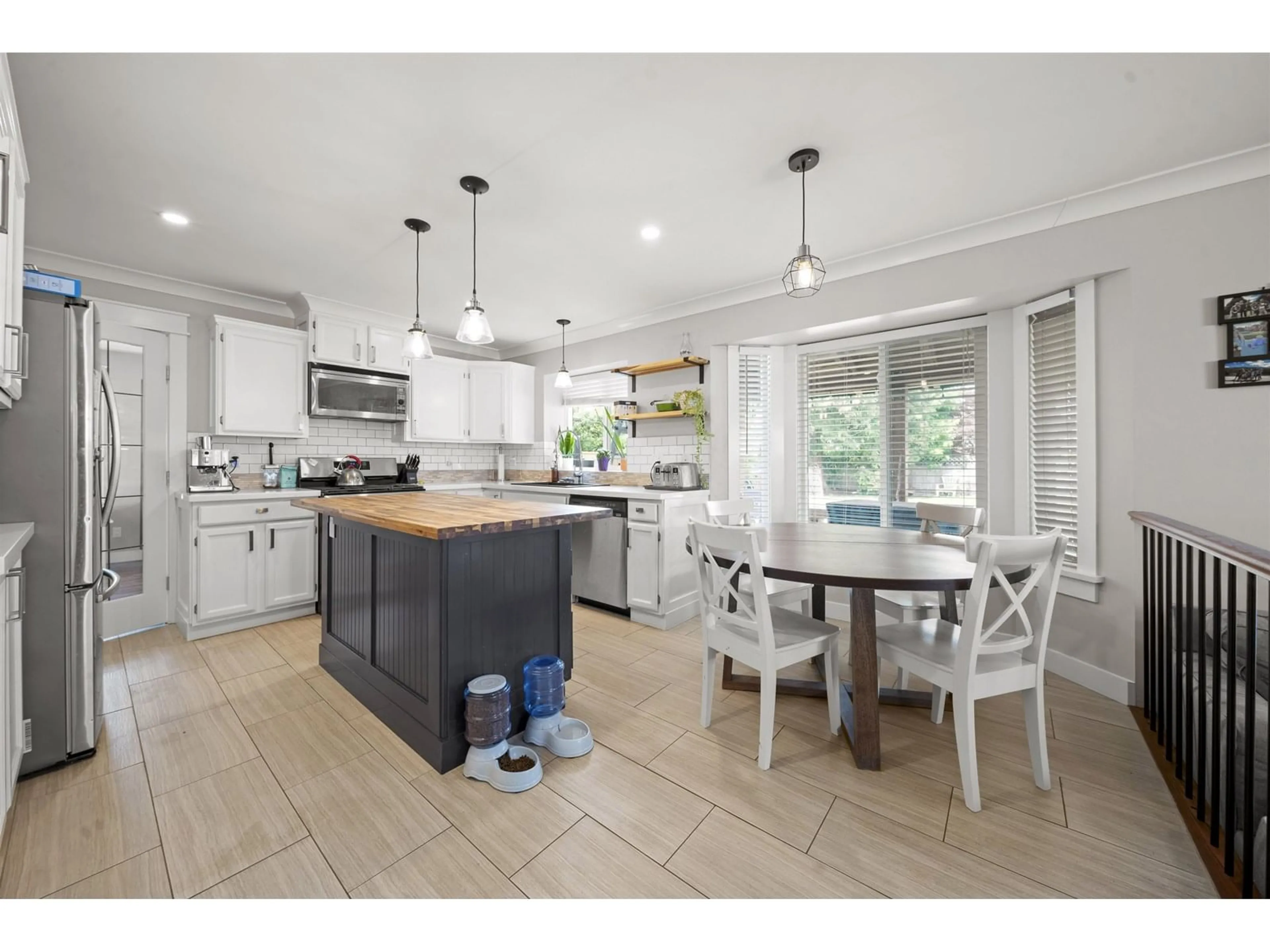 Open concept kitchen, ceramic/tile floor for 6105 187A, Surrey British Columbia V3S7R5