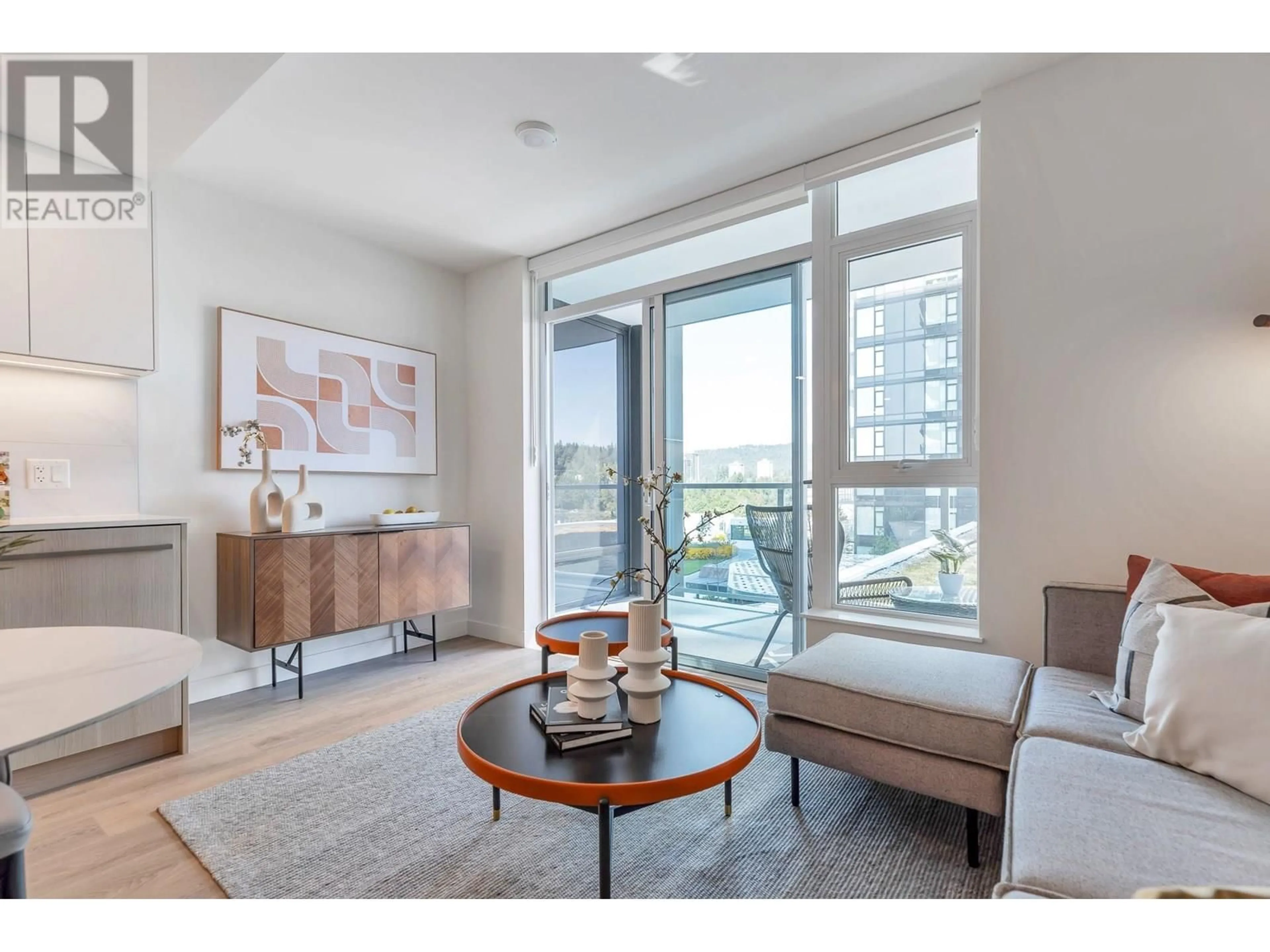 Living room with furniture, wood/laminate floor for 905 - 308 ALDERSON AVENUE, Coquitlam British Columbia V3K0J2