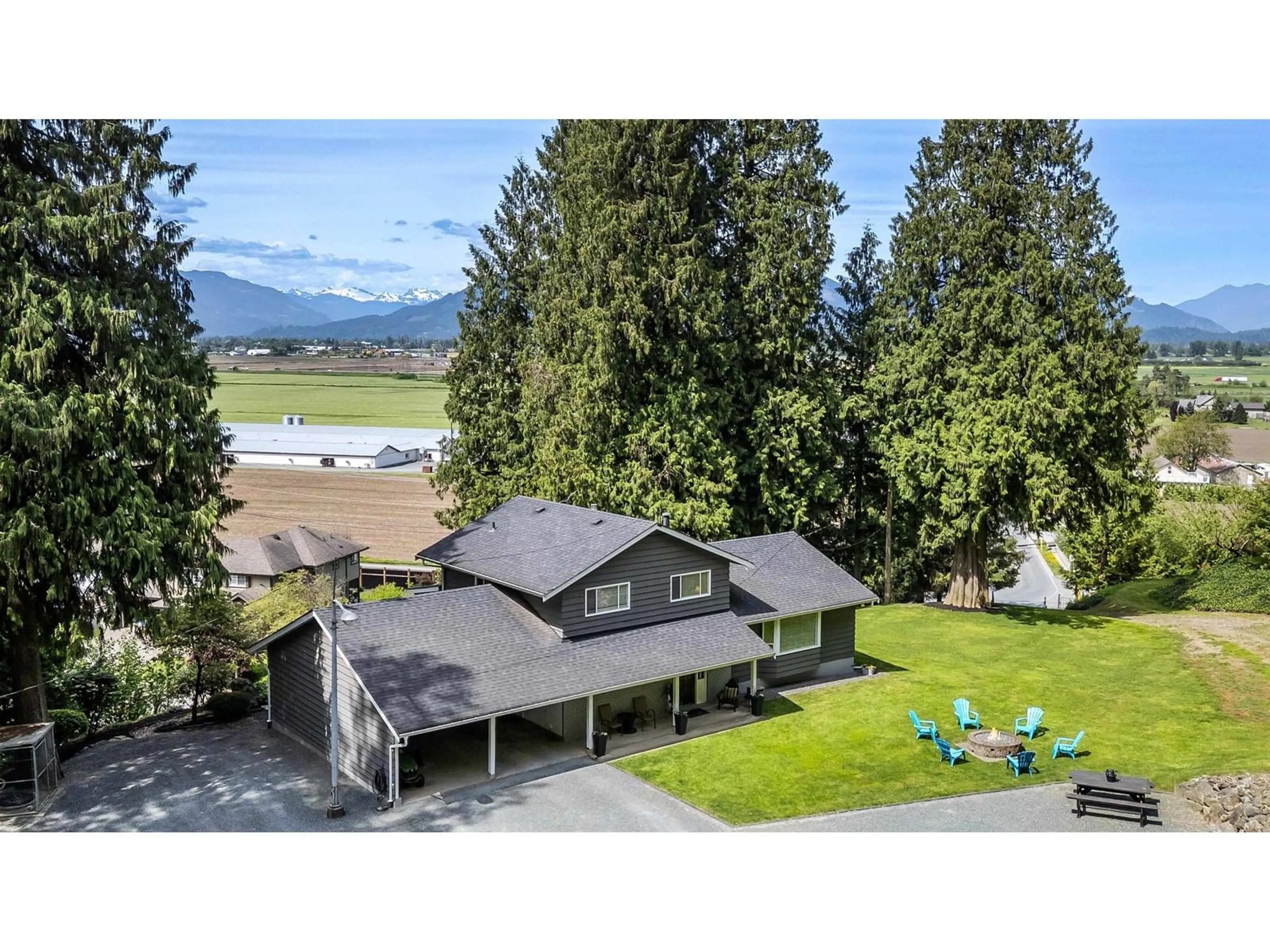 A pic from outside/outdoor area/front of a property/back of a property/a pic from drone, water/lake/river/ocean view for 7965 ANNIS ROAD, Chilliwack British Columbia V2P6H3