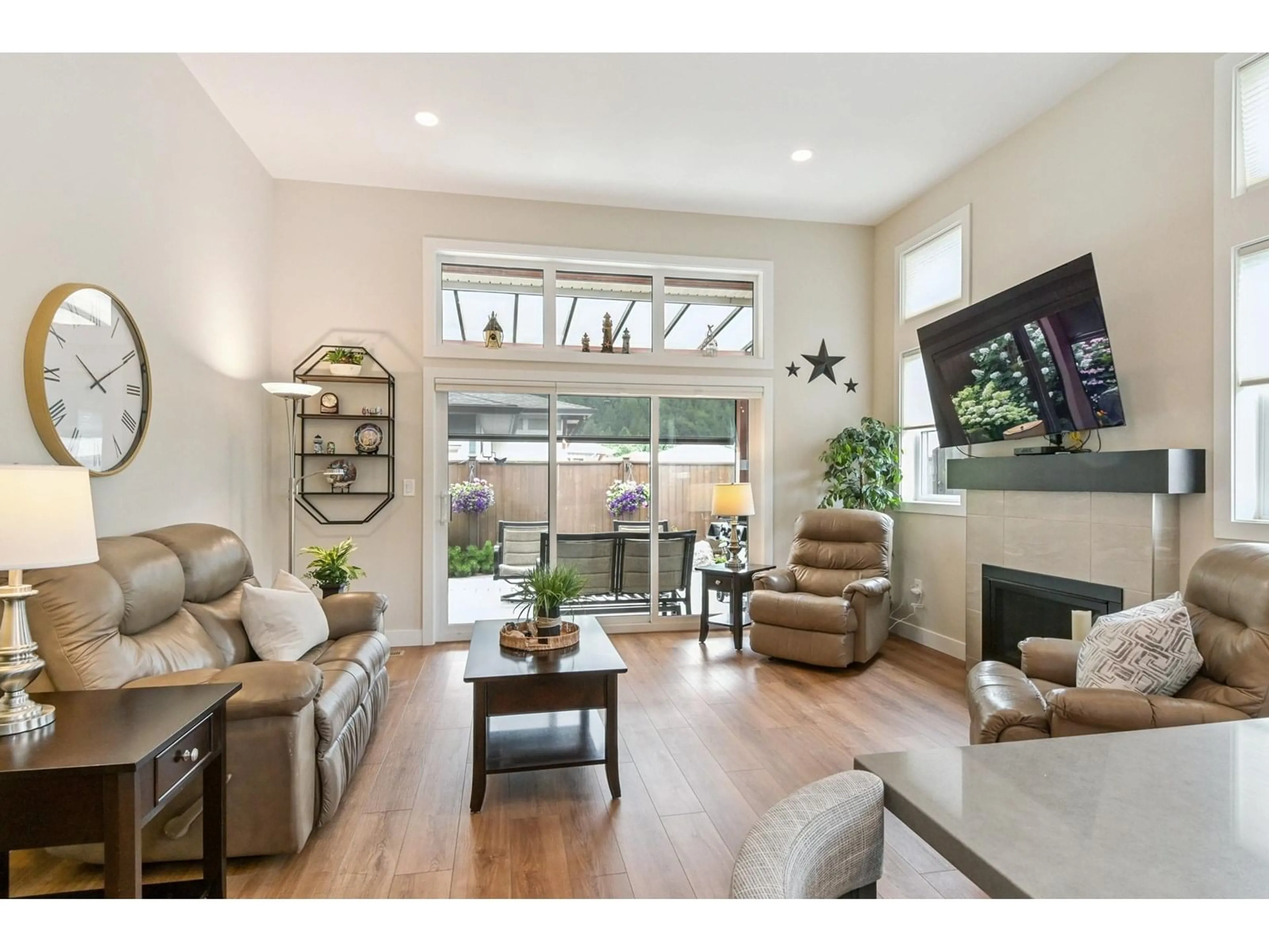 Living room with furniture, wood/laminate floor for 84 - 46110 THOMAS ROAD, Chilliwack British Columbia V2R2R4