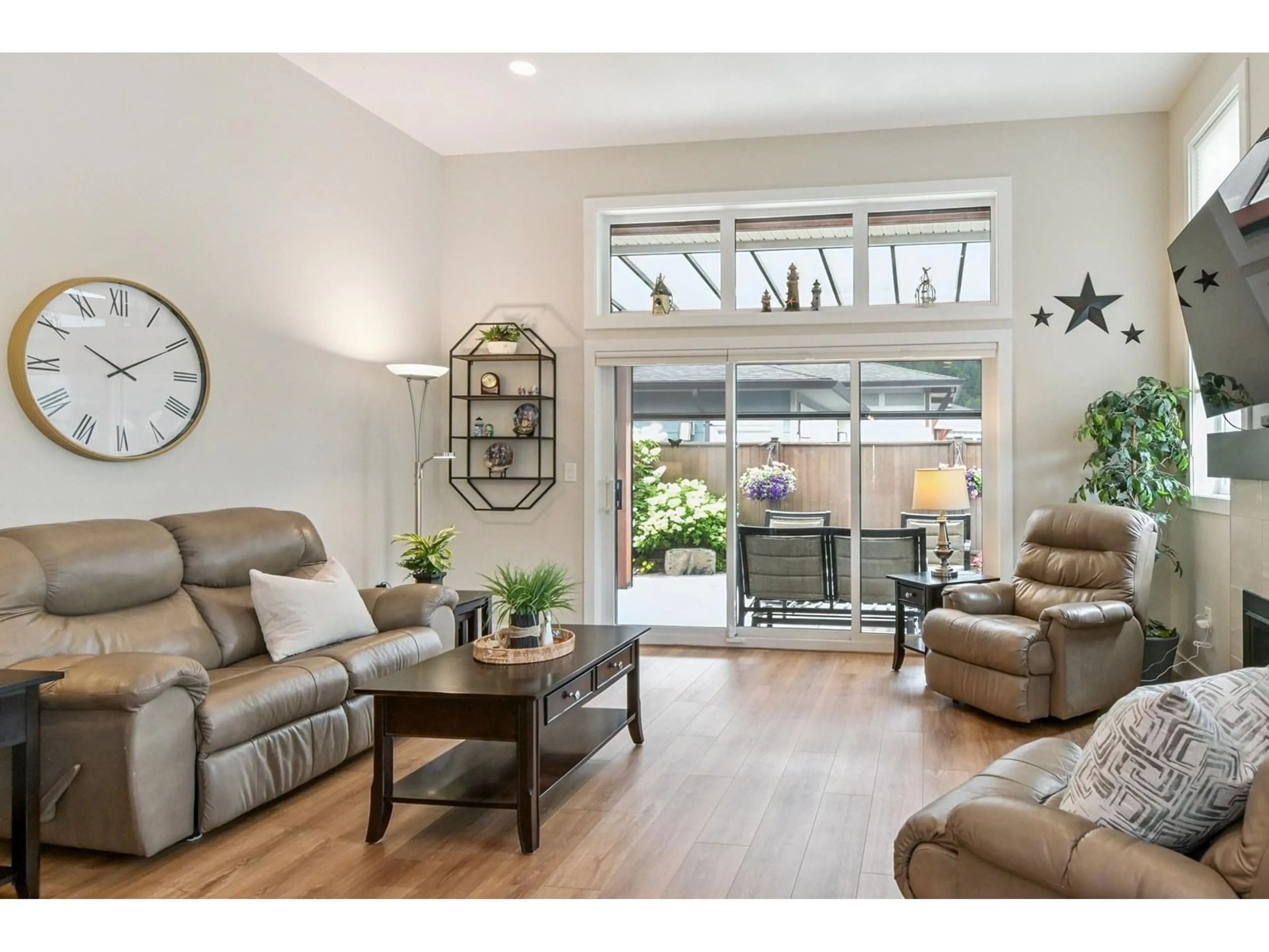 Living room with furniture, wood/laminate floor for 84 - 46110 THOMAS ROAD, Chilliwack British Columbia V2R2R4
