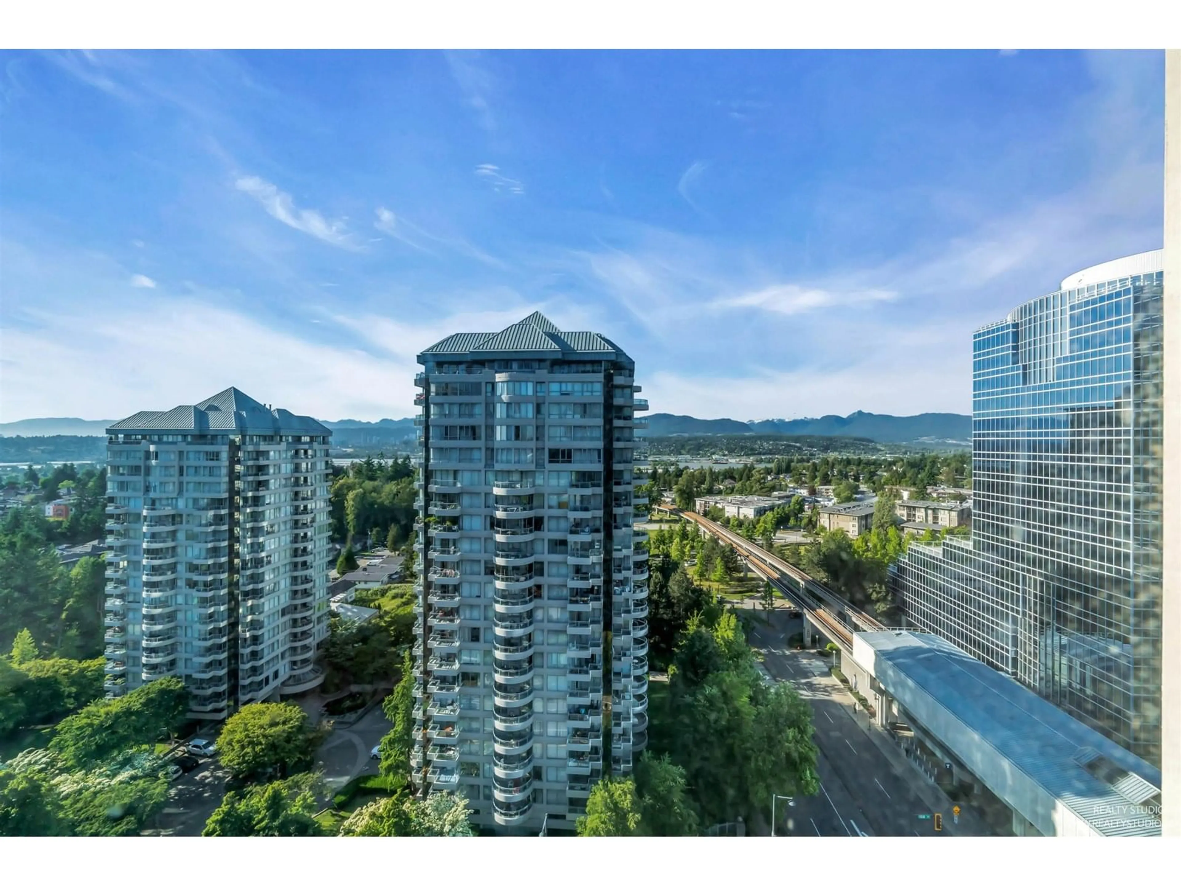 A pic from outside/outdoor area/front of a property/back of a property/a pic from drone, city buildings view from balcony for 1710 - 10777 UNIVERSITY, Surrey British Columbia V3T0E7