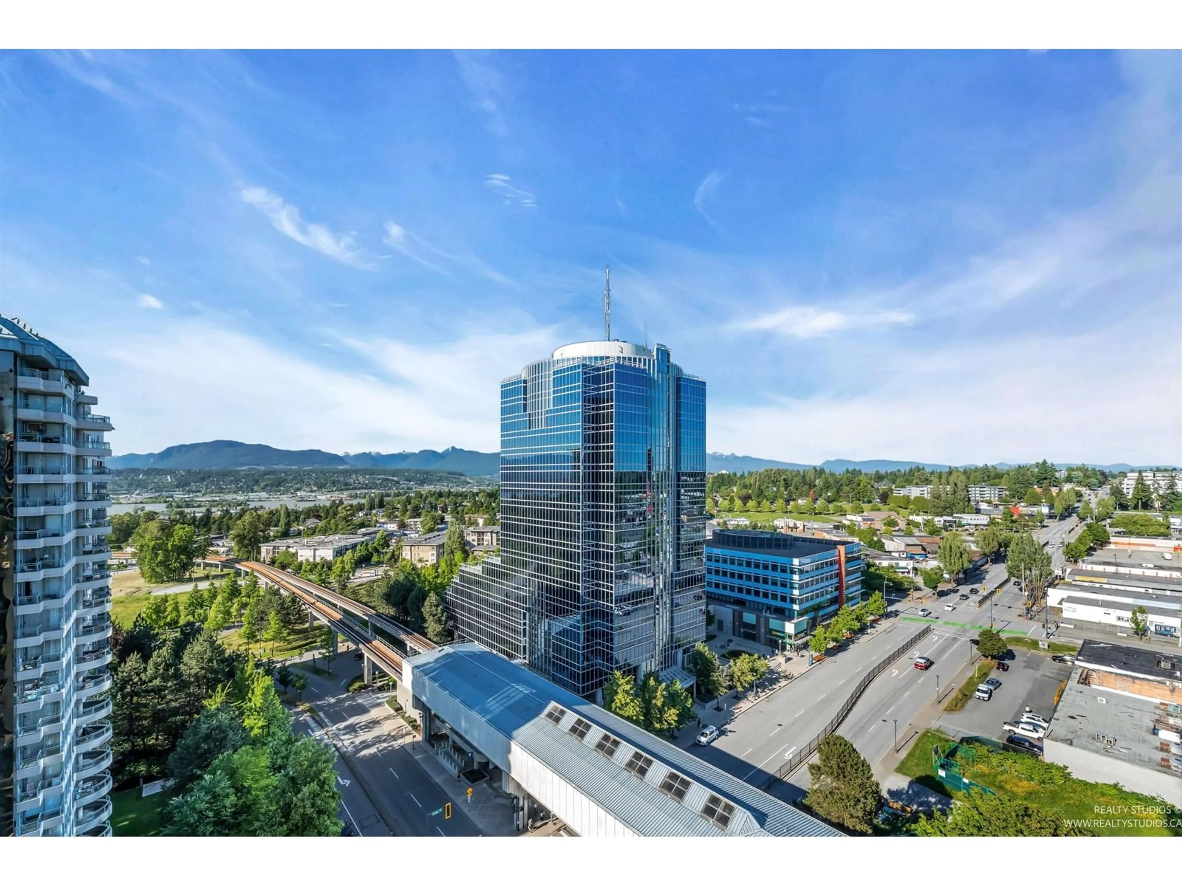 A pic from outside/outdoor area/front of a property/back of a property/a pic from drone, city buildings view from balcony for 1710 - 10777 UNIVERSITY, Surrey British Columbia V3T0E7