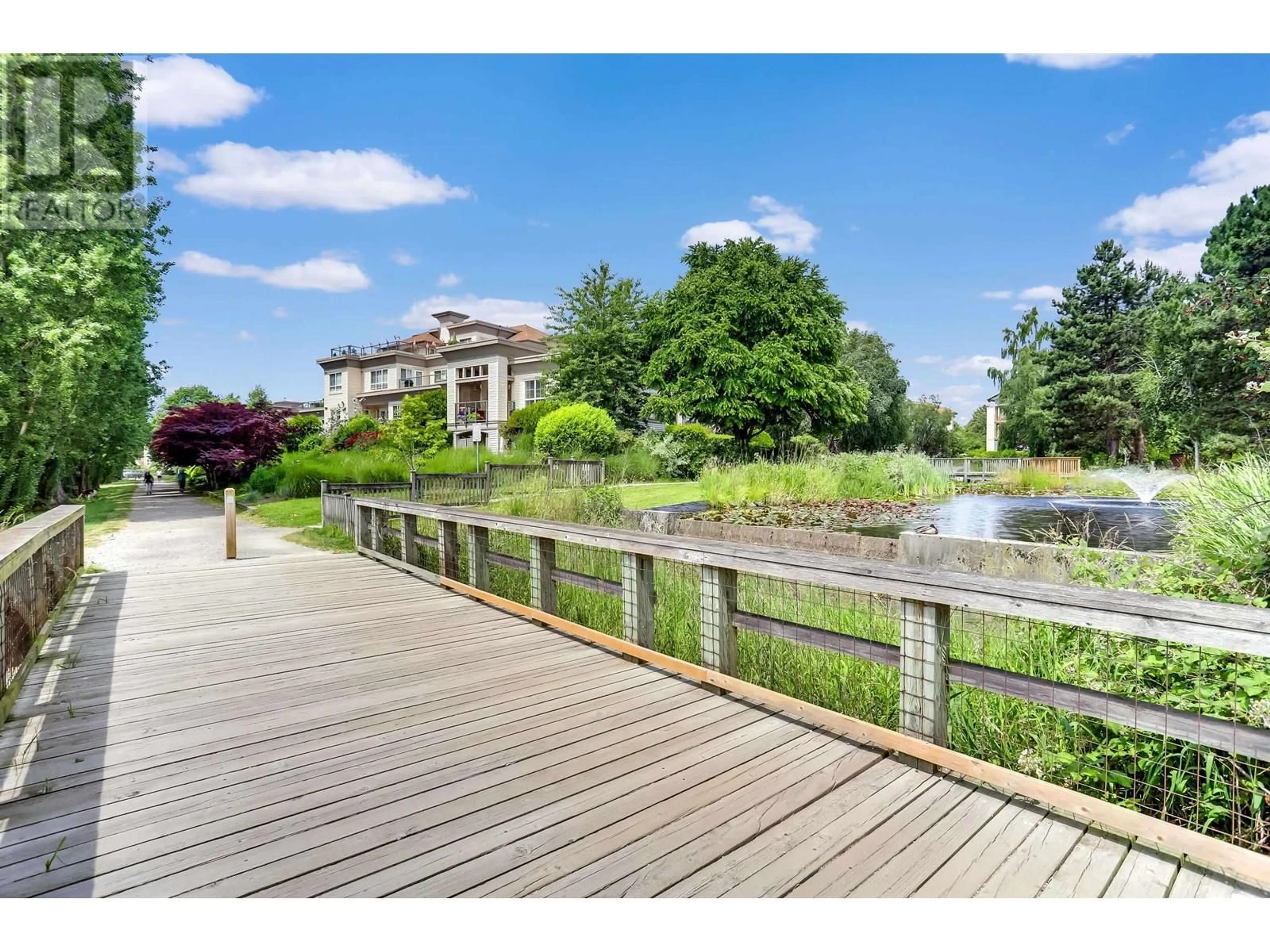 A pic from outside/outdoor area/front of a property/back of a property/a pic from drone, water/lake/river/ocean view for 313 - 5500 ANDREWS ROAD, Richmond British Columbia V7E6M9