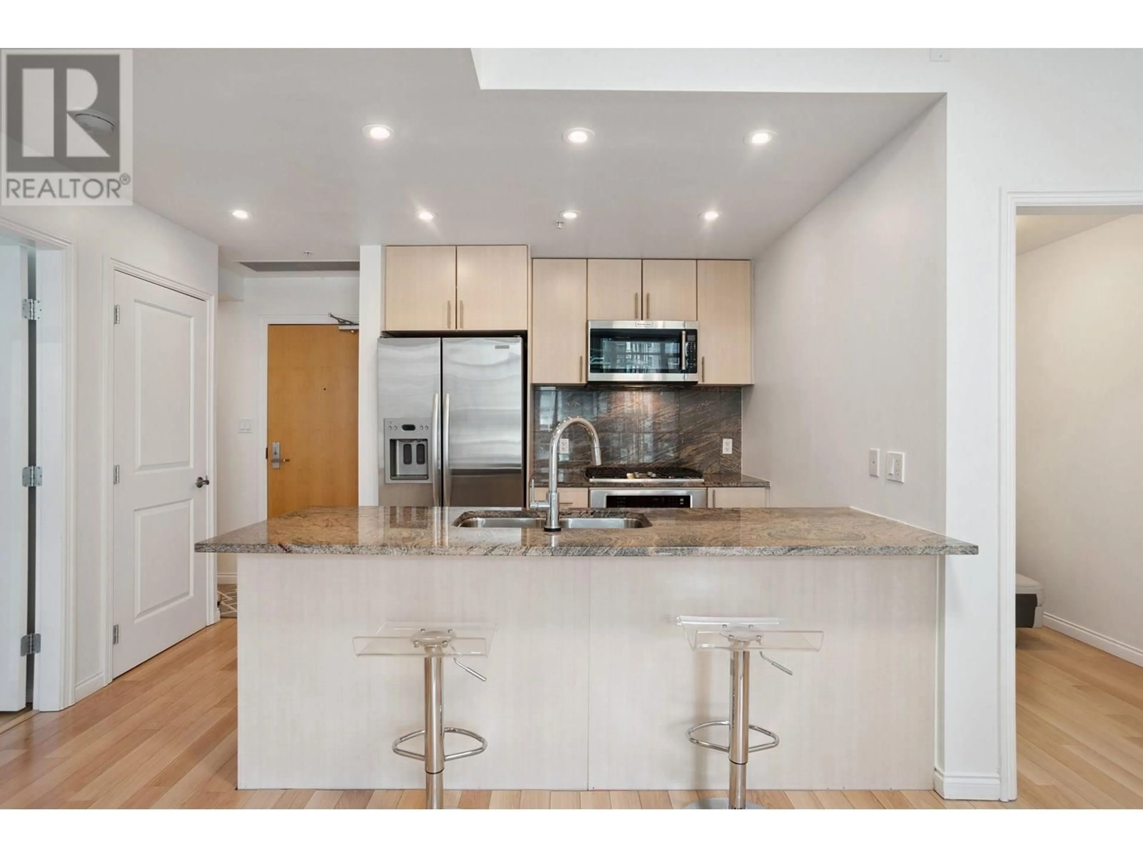 Open concept kitchen, unknown for 807 - 1211 MELVILLE STREET, Vancouver British Columbia V6E0A7