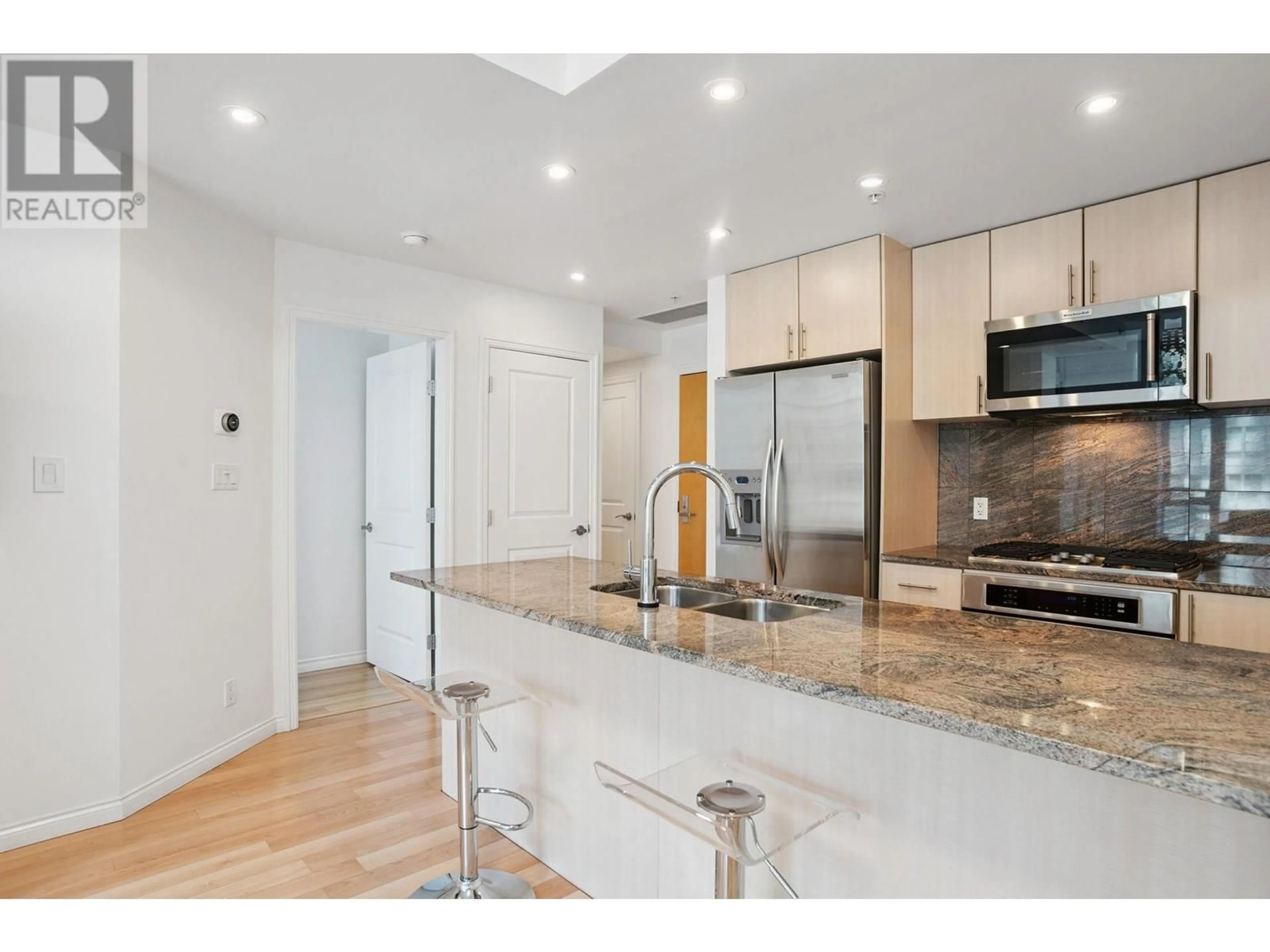 Open concept kitchen, unknown for 807 - 1211 MELVILLE STREET, Vancouver British Columbia V6E0A7