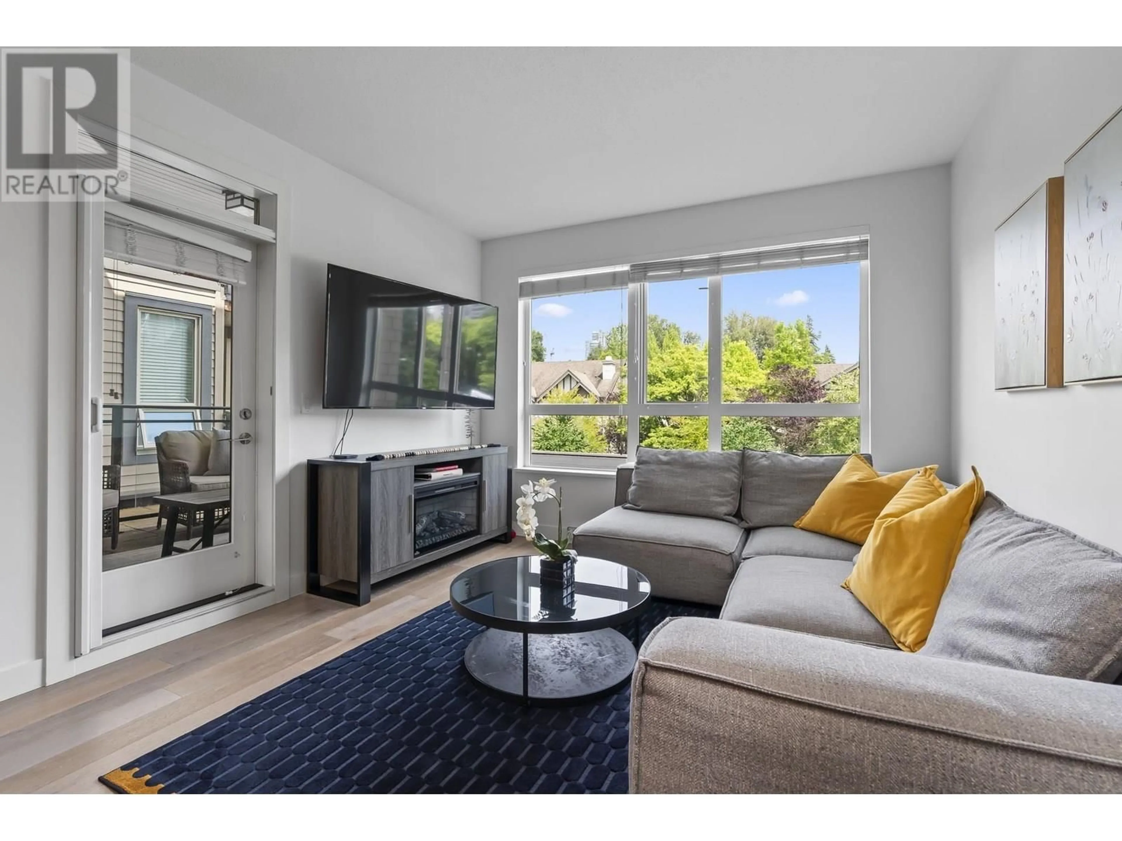Living room with furniture, unknown for 416 - 3399 NOEL DRIVE, Burnaby British Columbia V3J0G8