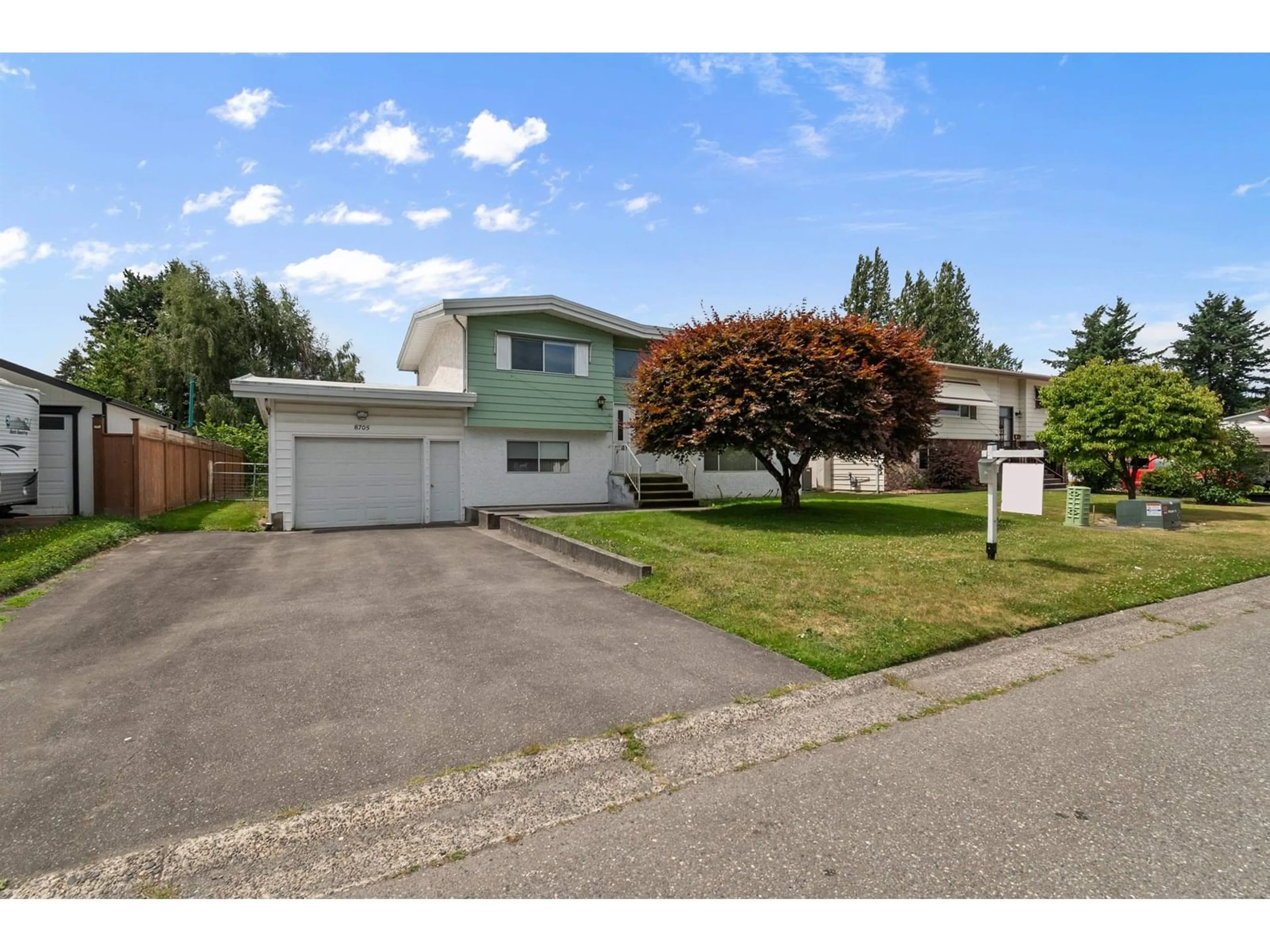 A pic from outside/outdoor area/front of a property/back of a property/a pic from drone, street for 8705 BAKER DRIVE, Chilliwack British Columbia V2P7A3