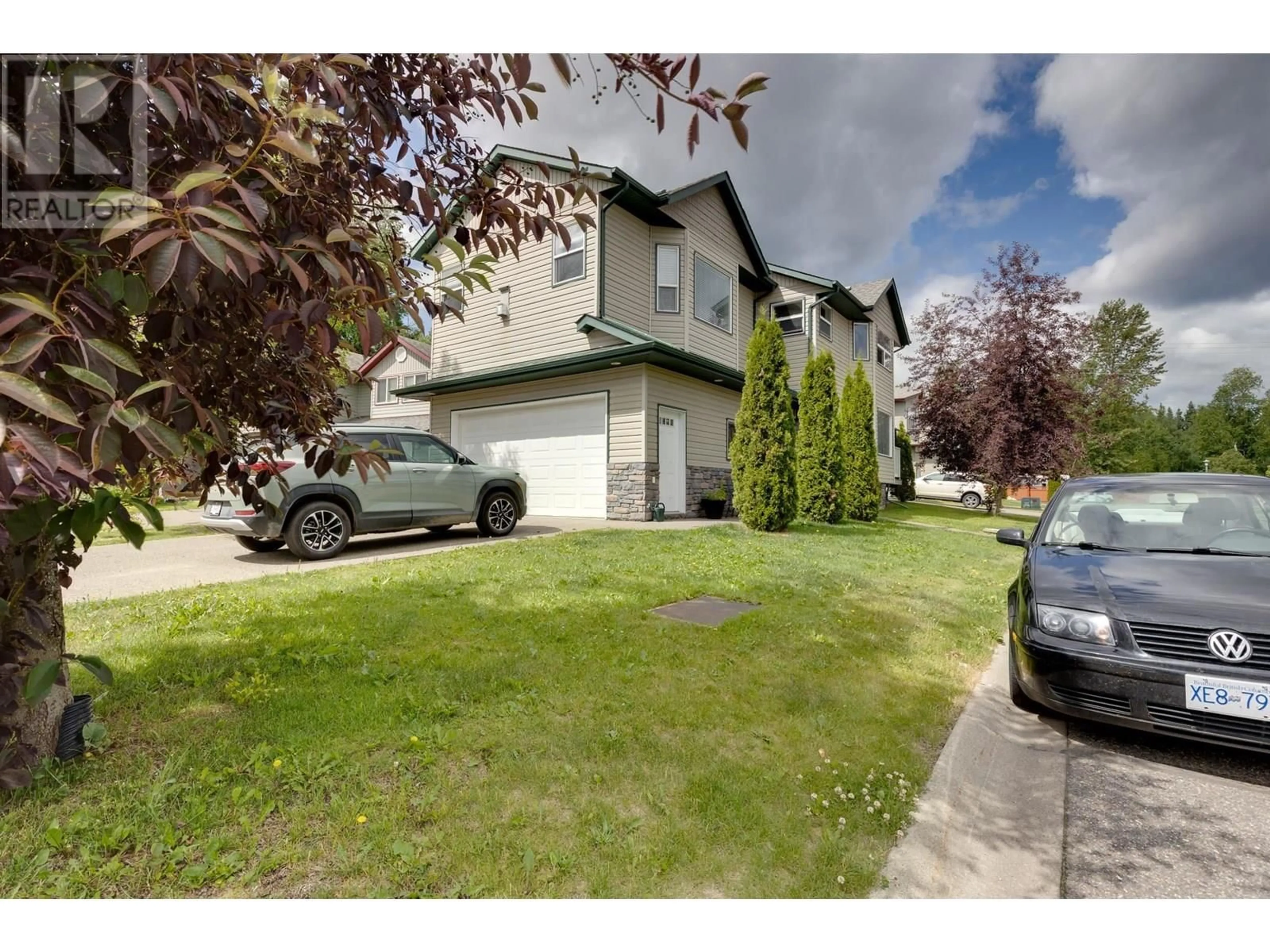 A pic from outside/outdoor area/front of a property/back of a property/a pic from drone, street for 115 - 1299 OSPIKA BOULEVARD, Prince George British Columbia V2M7G2