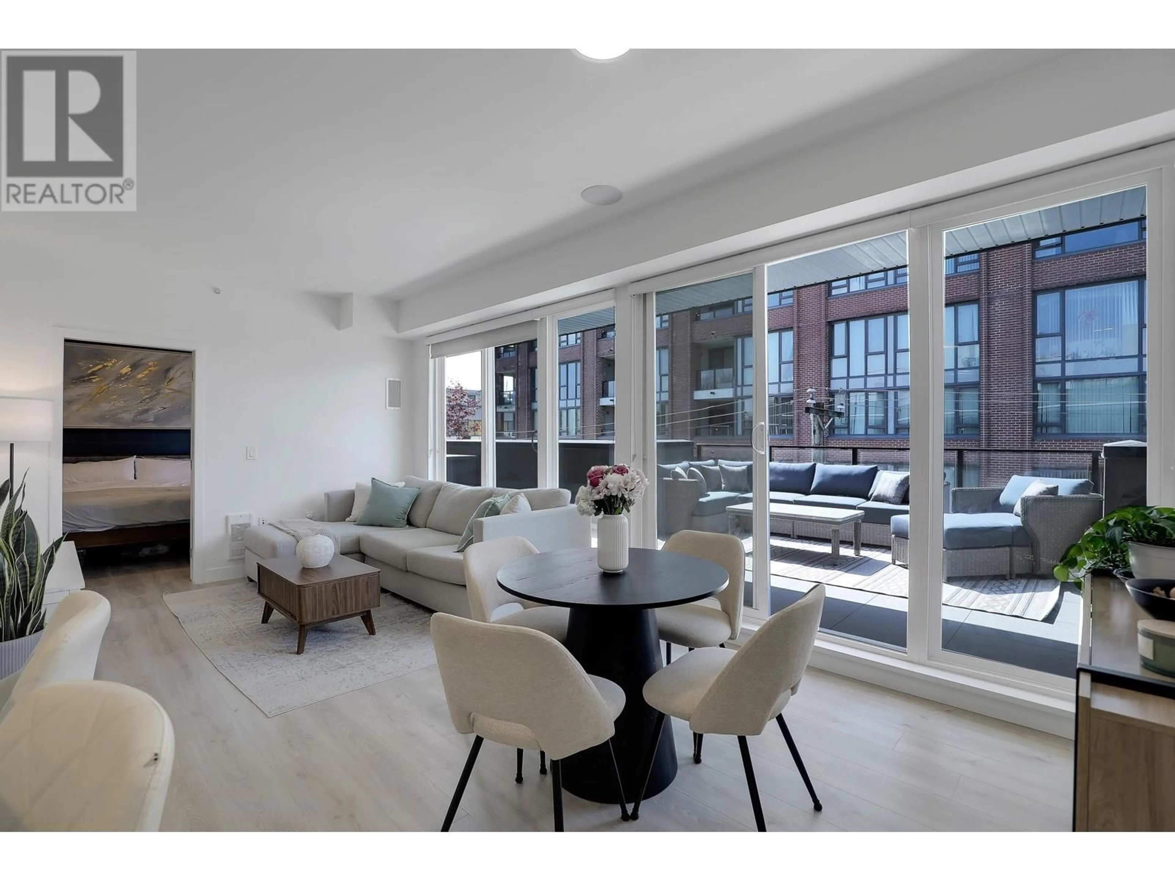 Living room with furniture, unknown for 401 - 2688 DUKE STREET, Vancouver British Columbia V5R4S9