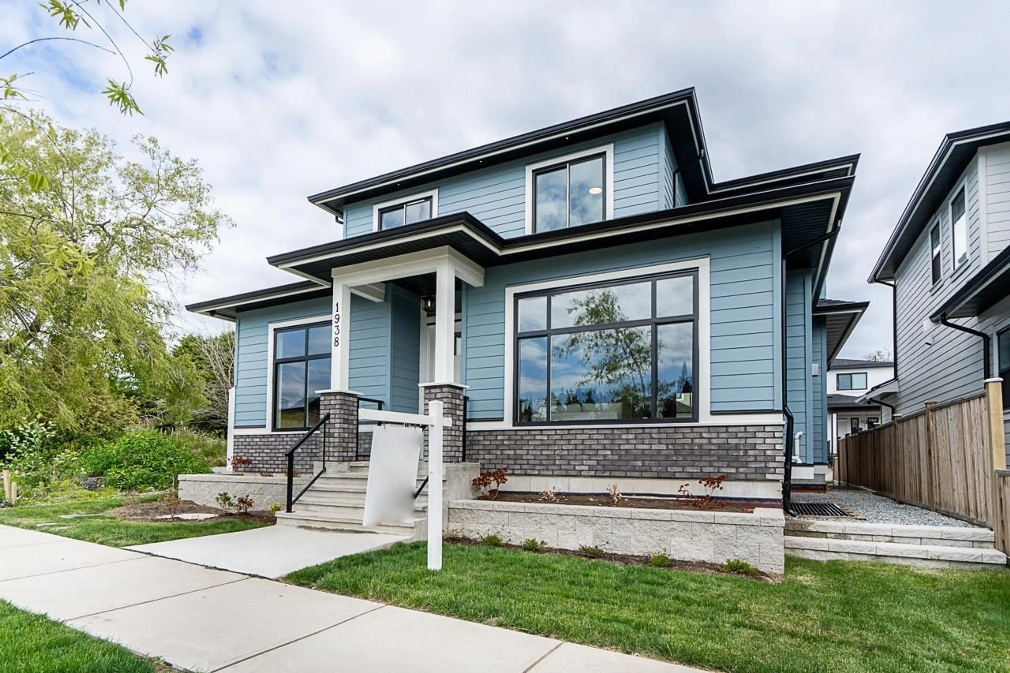 Home with brick exterior material, street for 1938 167A, Surrey British Columbia V3Z1K2