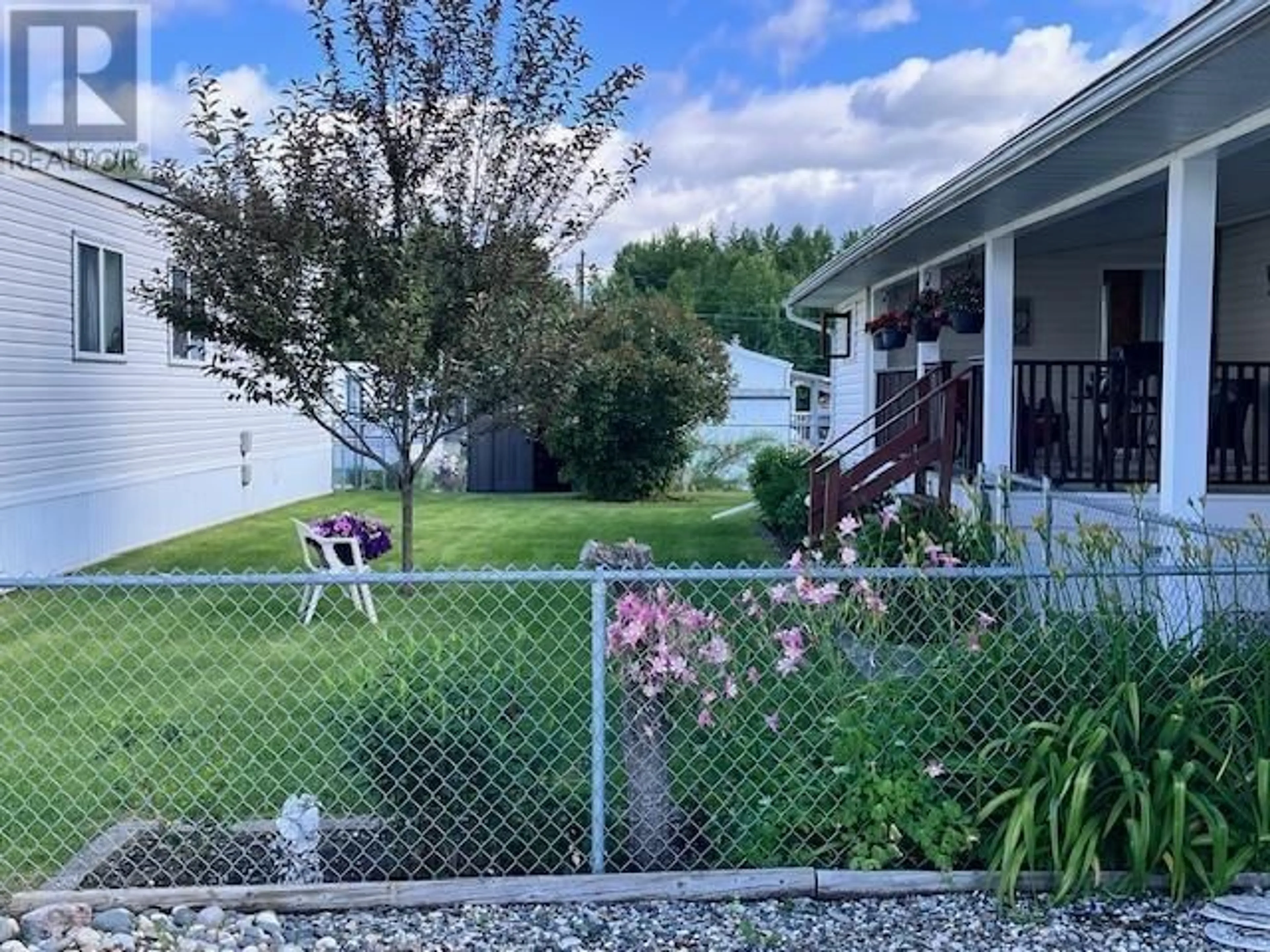 A pic from outside/outdoor area/front of a property/back of a property/a pic from drone, mountain view for 9 - 602 ELM STREET, Quesnel British Columbia V2J3X1