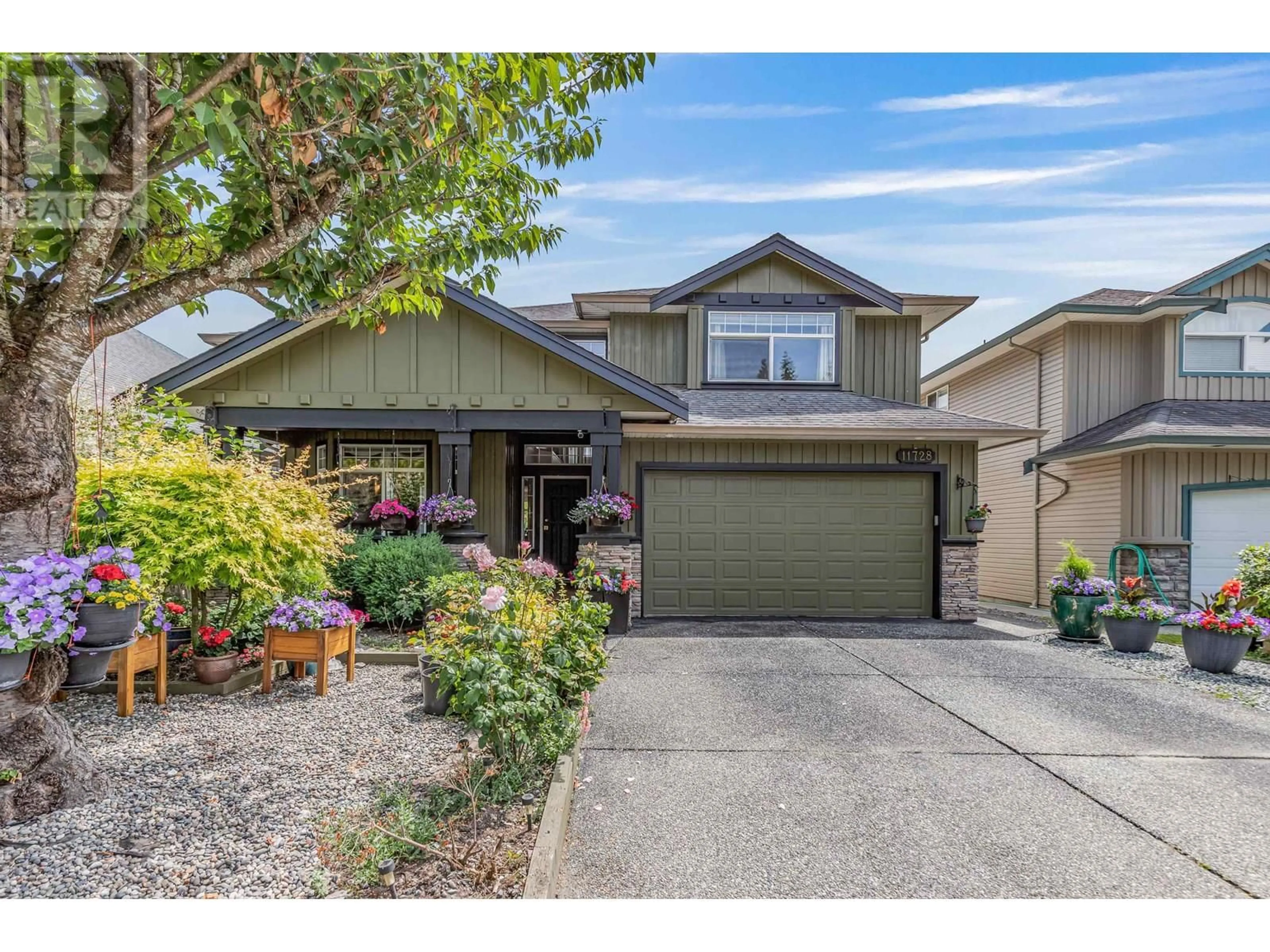 Home with vinyl exterior material, street for 11728 CREEKSIDE STREET, Maple Ridge British Columbia V4R2V4