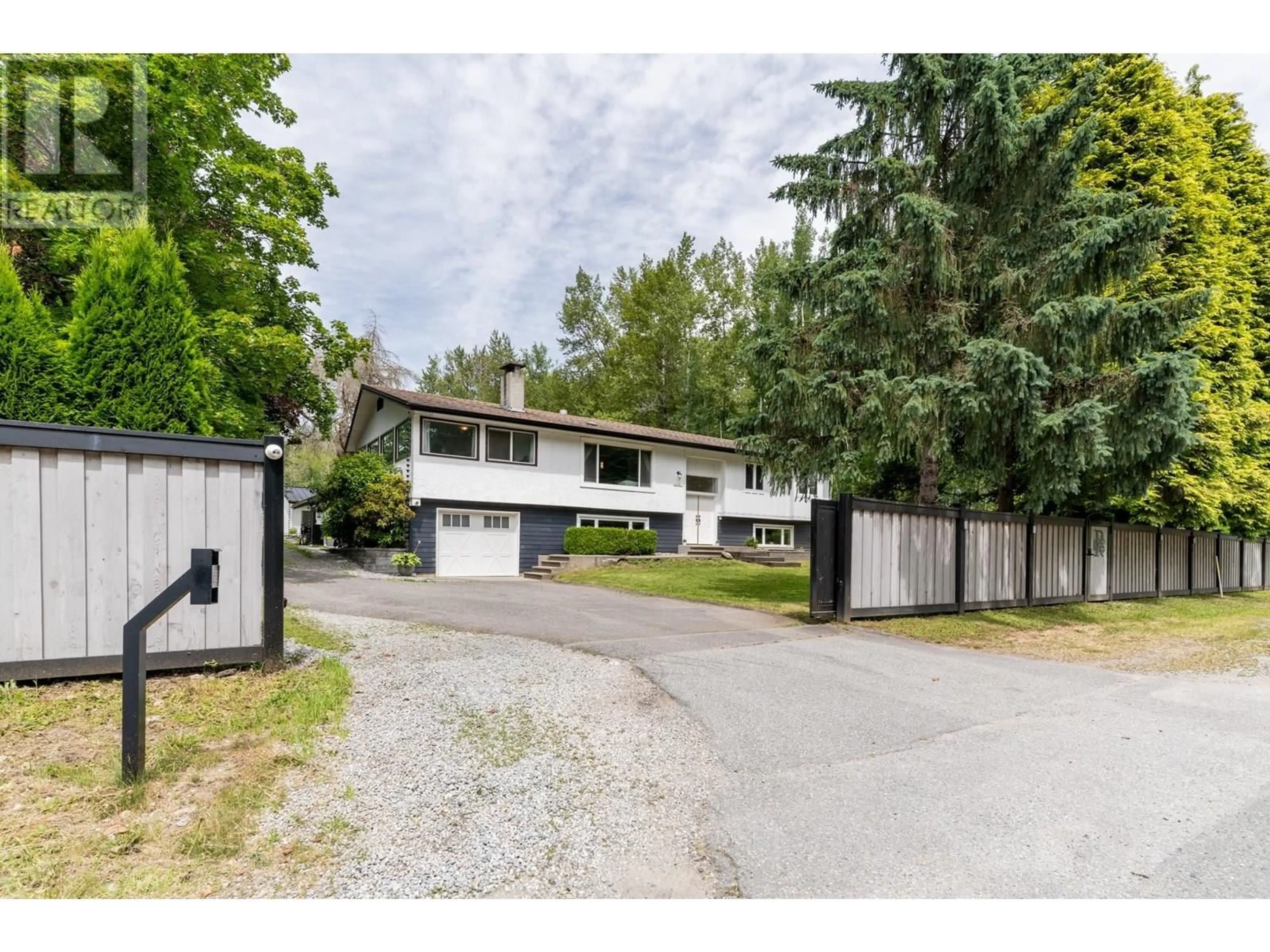 A pic from outside/outdoor area/front of a property/back of a property/a pic from drone, street for 24991 100 AVENUE, Maple Ridge British Columbia V2W1S3