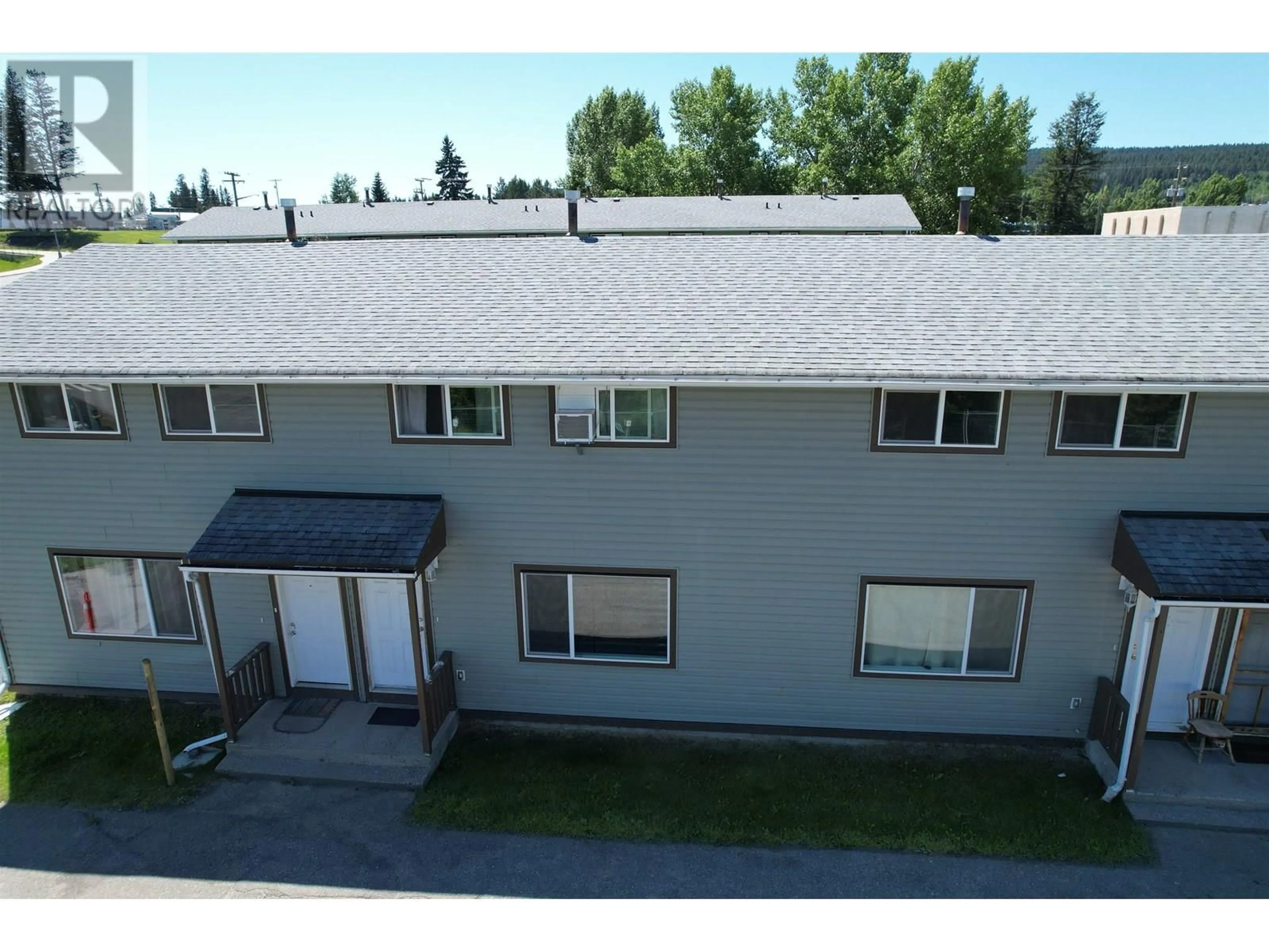 A pic from outside/outdoor area/front of a property/back of a property/a pic from drone, unknown for 2 - 565D BIRCH AVENUE, 100 Mile House British Columbia V0K2E0