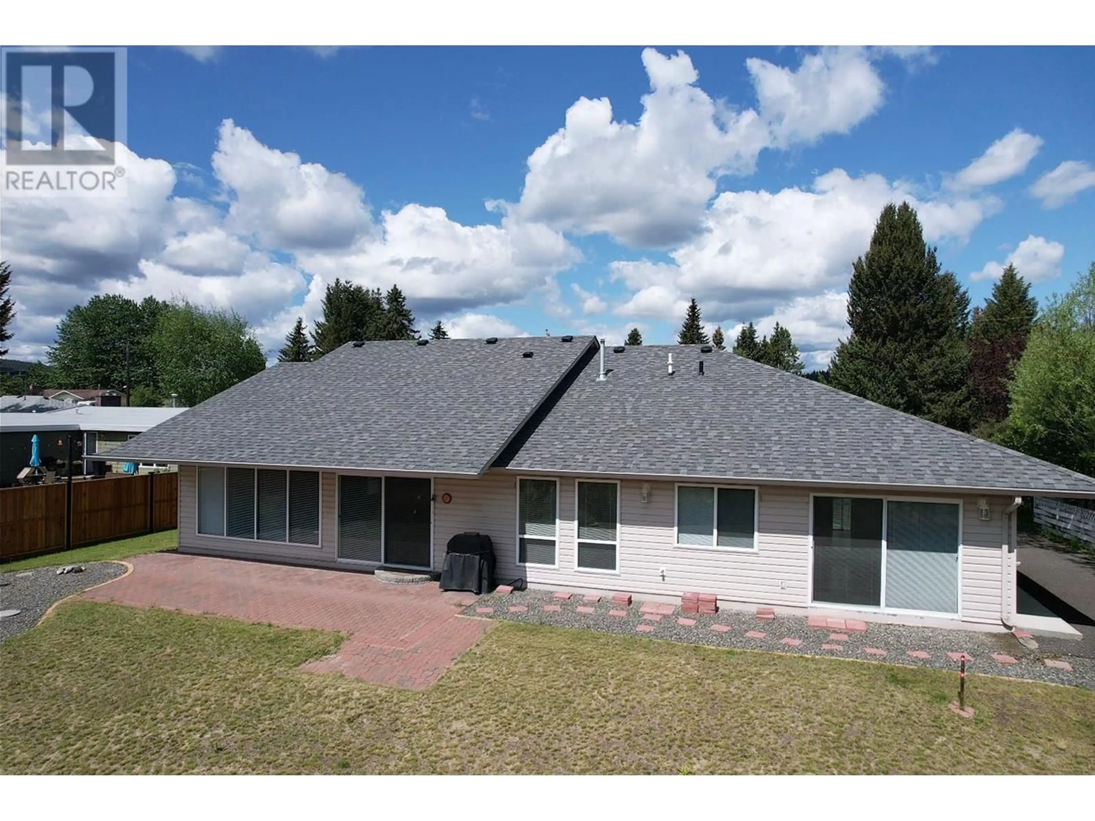 Home with vinyl exterior material, unknown for 145 EVERGREEN CRESCENT, 100 Mile House British Columbia V0K2E0
