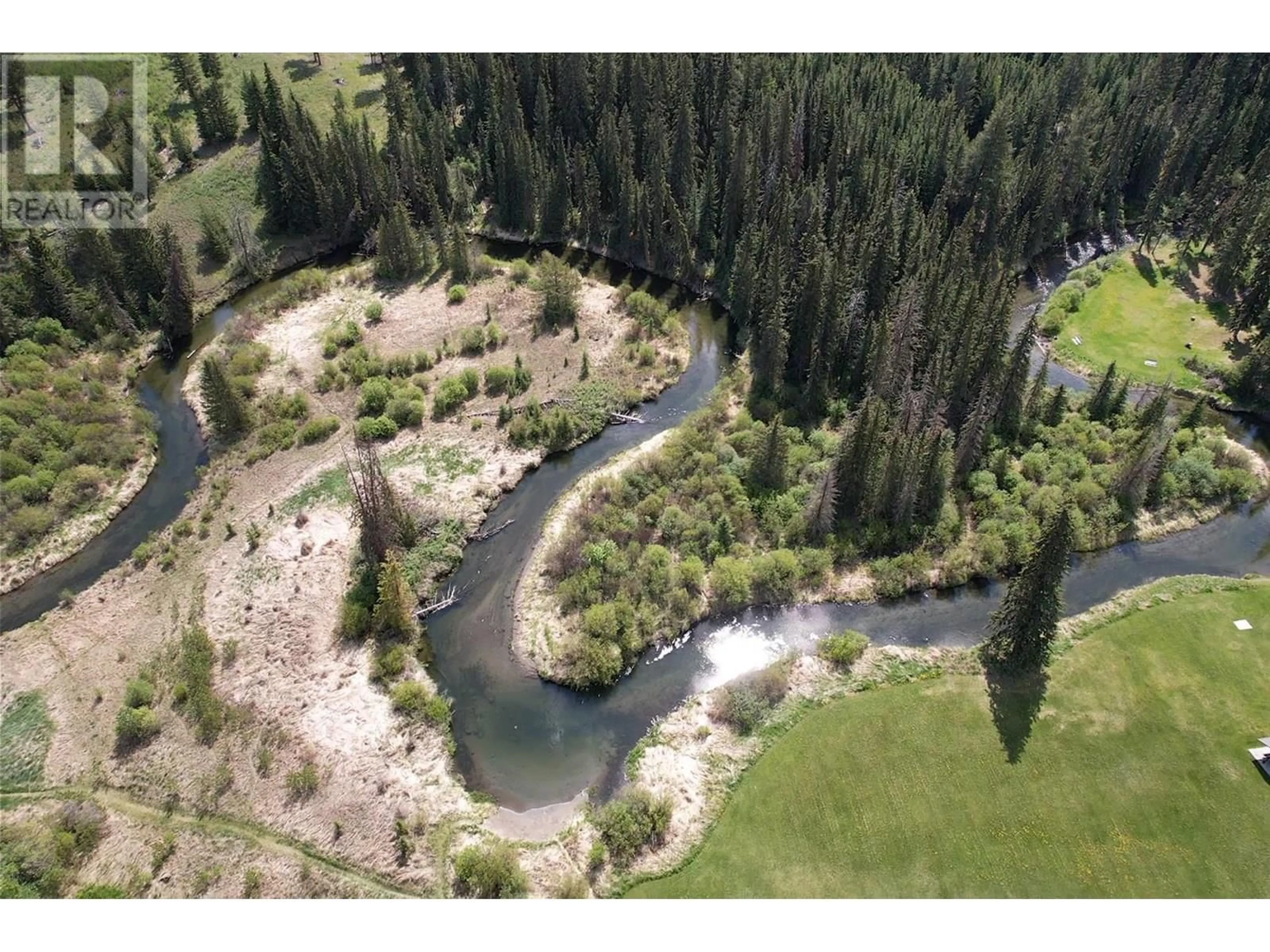 A pic from outside/outdoor area/front of a property/back of a property/a pic from drone, water/lake/river/ocean view for 145 EVERGREEN CRESCENT, 100 Mile House British Columbia V0K2E0