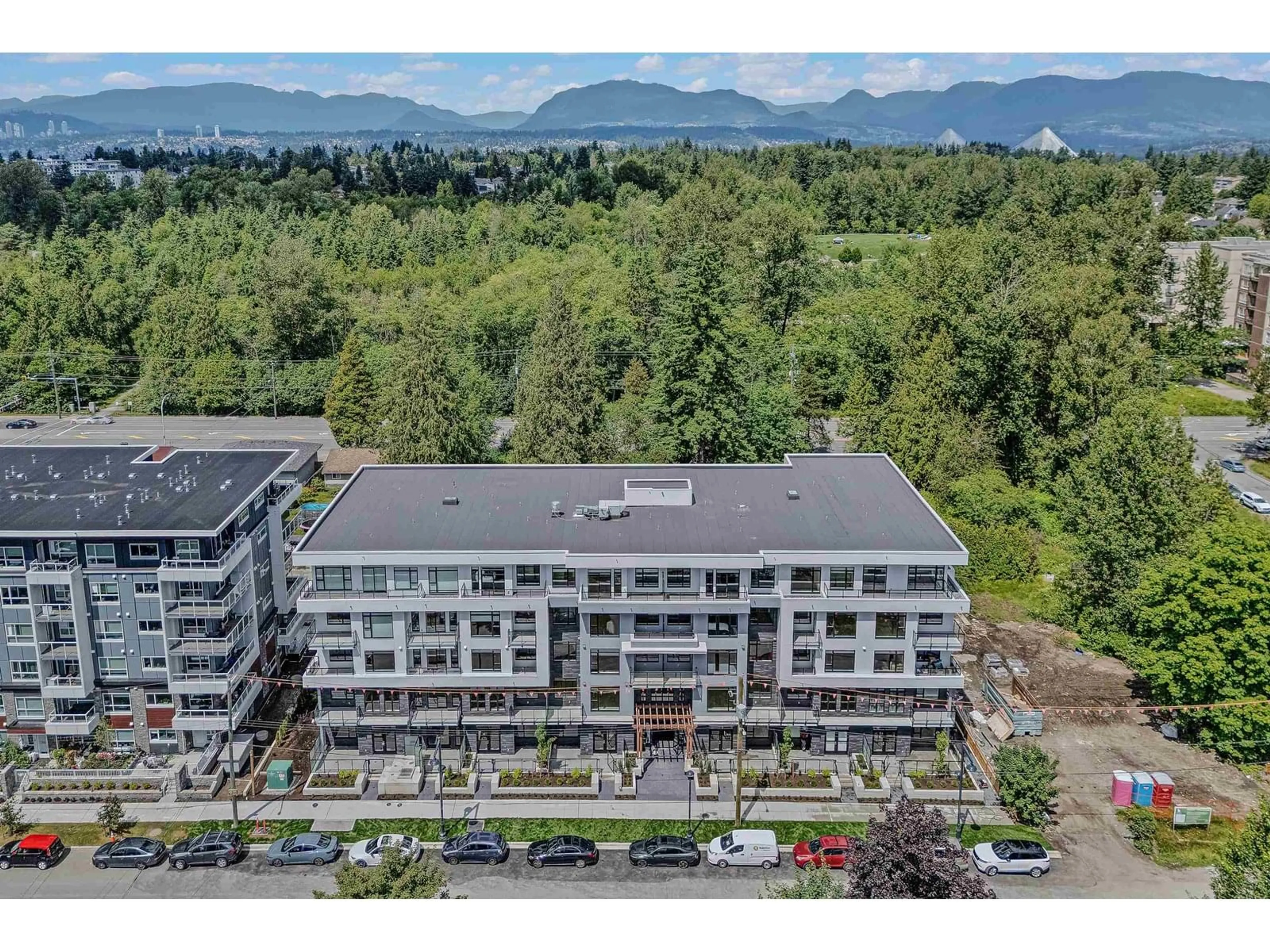 A pic from outside/outdoor area/front of a property/back of a property/a pic from drone, mountain view for 412 - 14257 103A, Surrey British Columbia V3T1T1