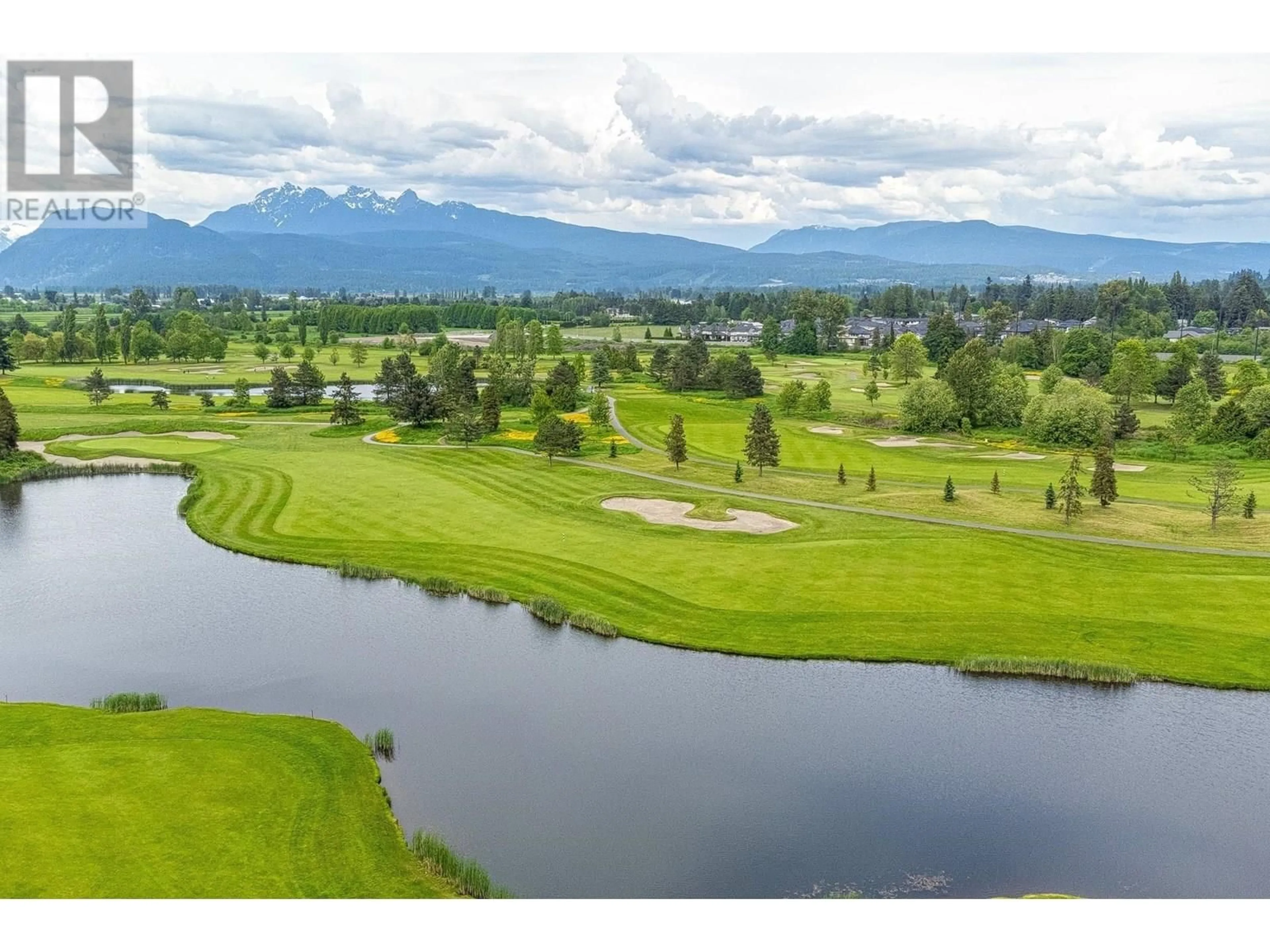 A pic from outside/outdoor area/front of a property/back of a property/a pic from drone, water/lake/river/ocean view for 416 - 19673 MEADOW GARDENS WAY, Pitt Meadows British Columbia V3Y0A1