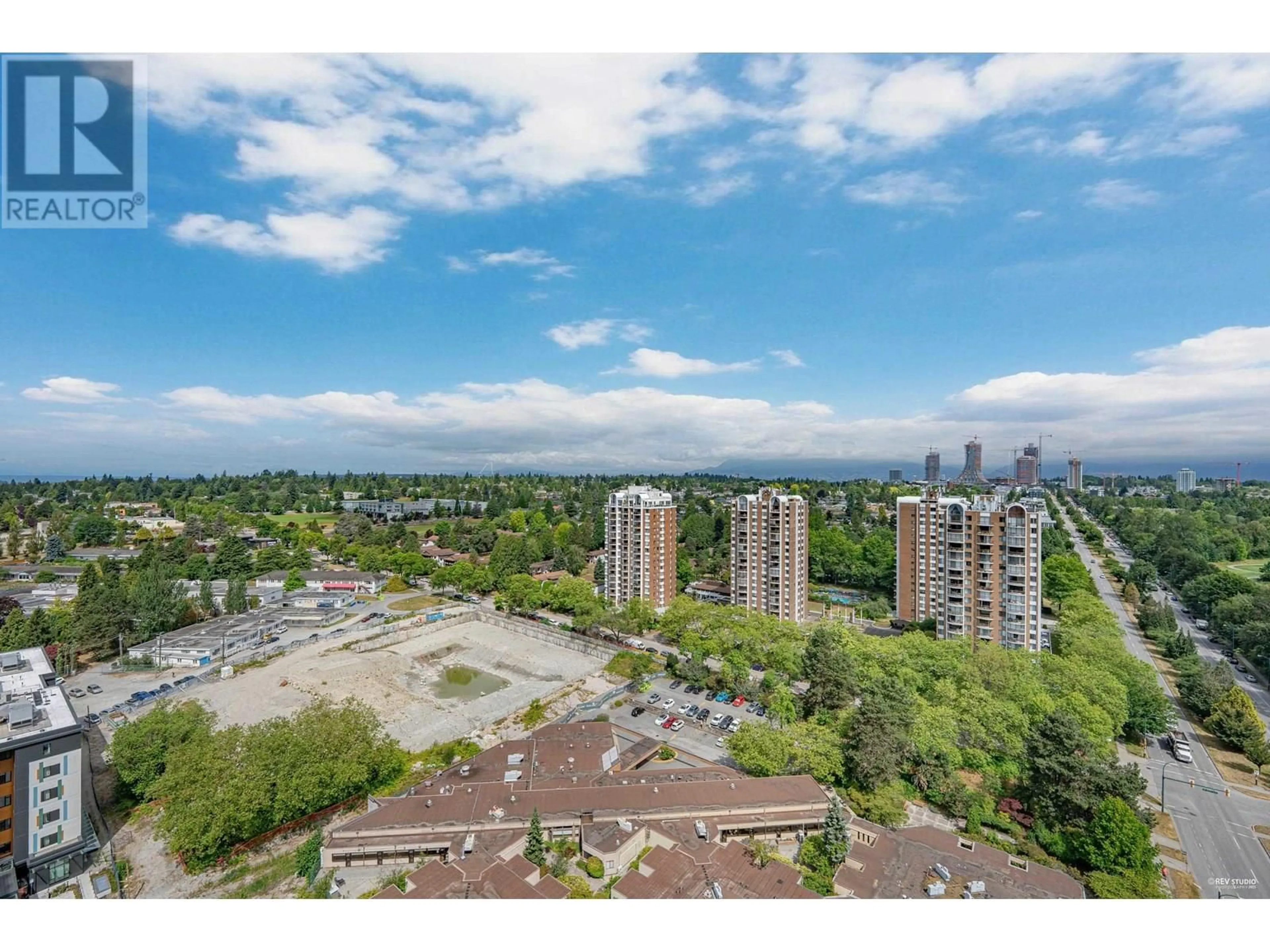 A pic from outside/outdoor area/front of a property/back of a property/a pic from drone, city buildings view from balcony for 2302 - 7433 CAMBIE STREET, Vancouver British Columbia V6P0J8