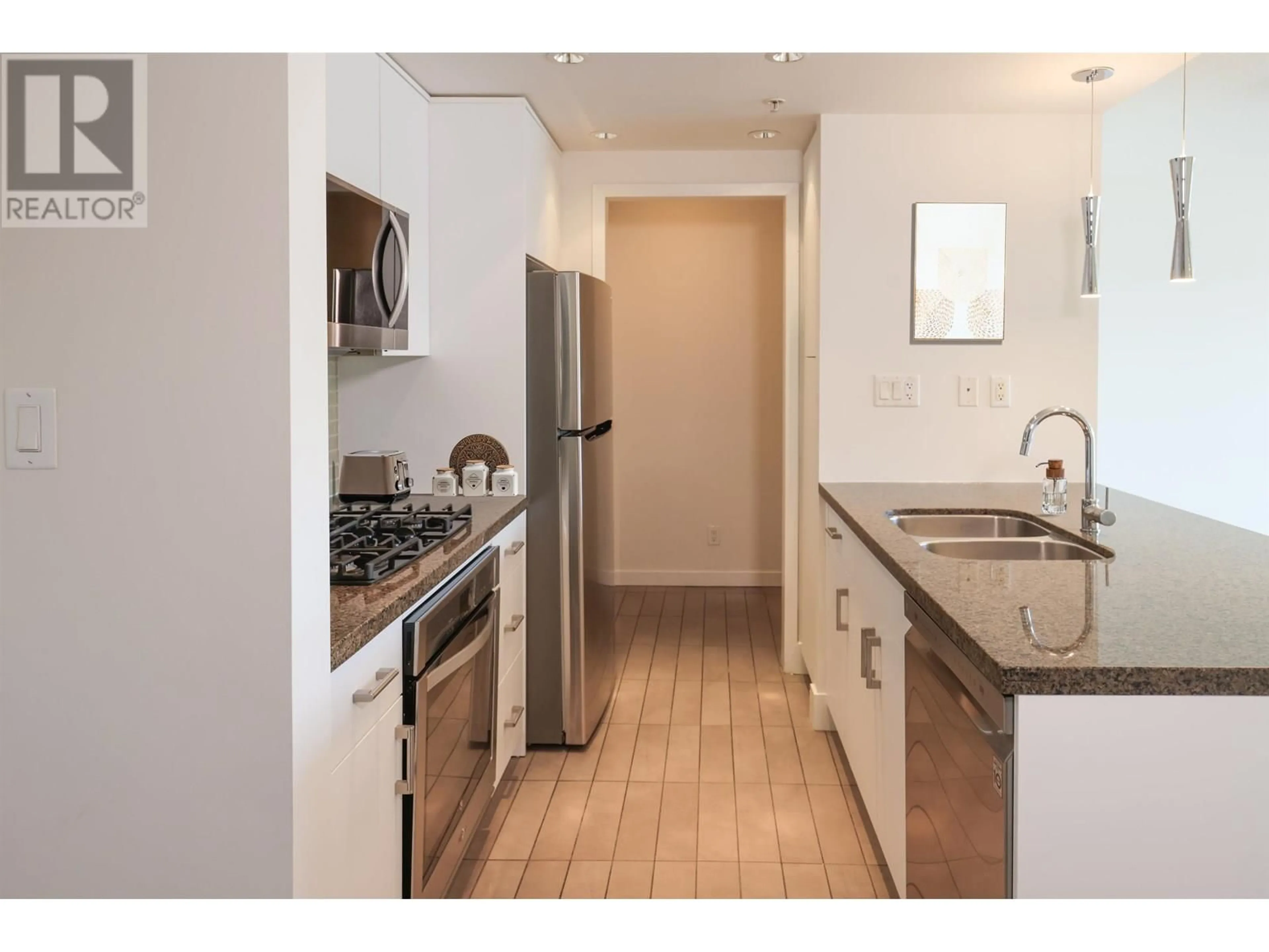 Standard kitchen, ceramic/tile floor for 907 - 980 COOPERAGE WAY, Vancouver British Columbia V6B0C3