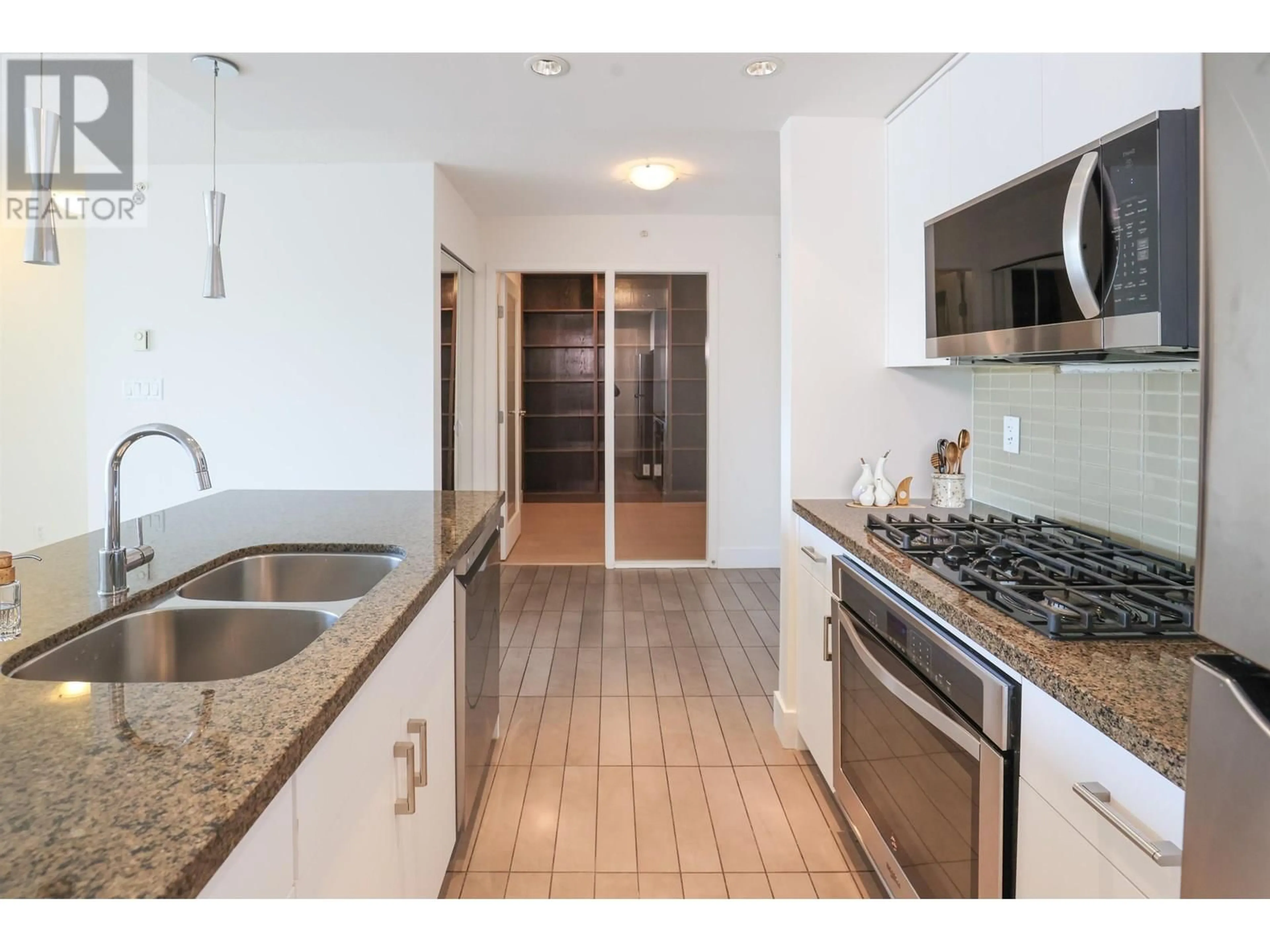 Standard kitchen, ceramic/tile floor for 907 - 980 COOPERAGE WAY, Vancouver British Columbia V6B0C3