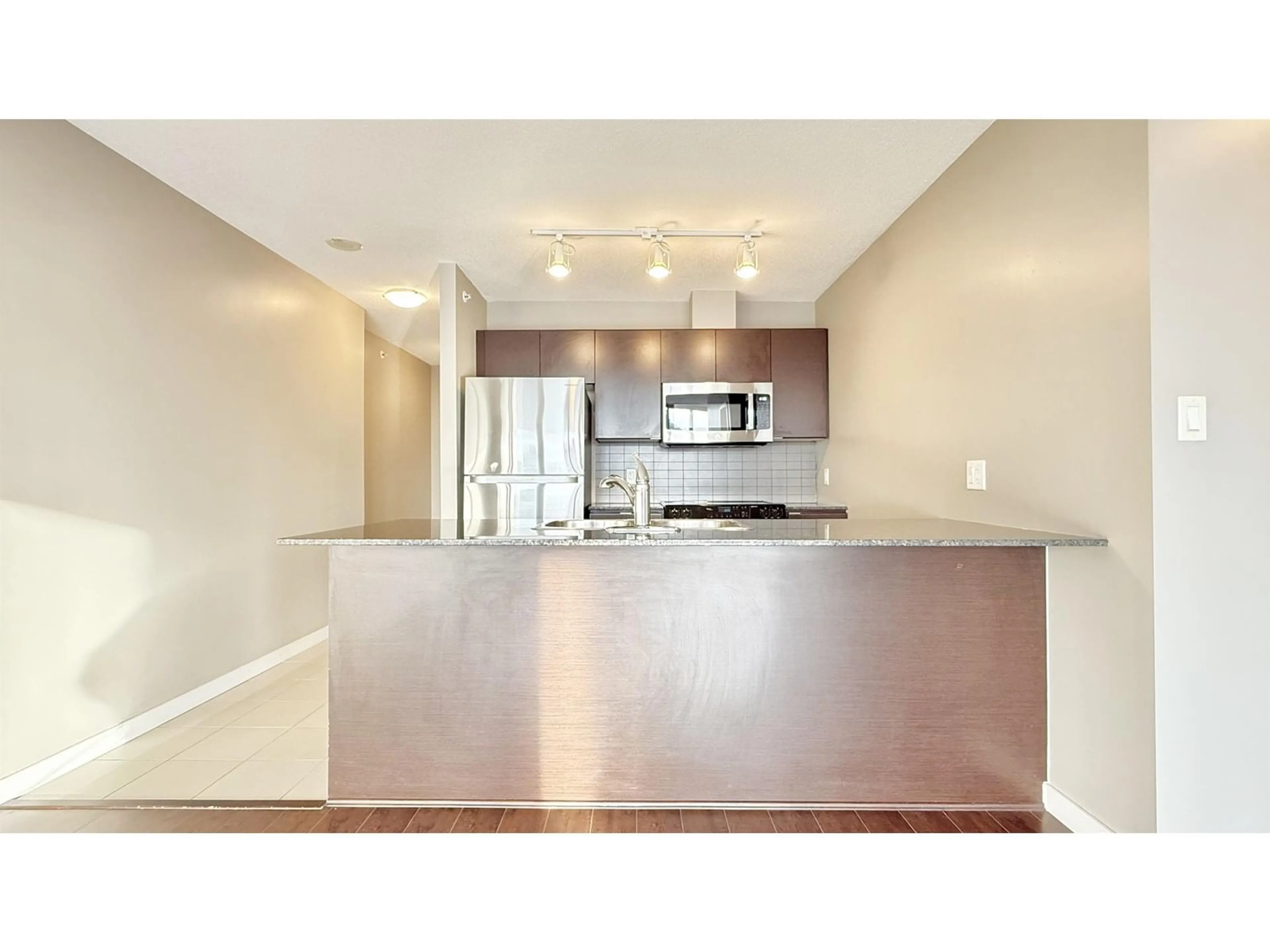 Open concept kitchen, unknown for 2202 - 13618 100, Surrey British Columbia V3T0A8