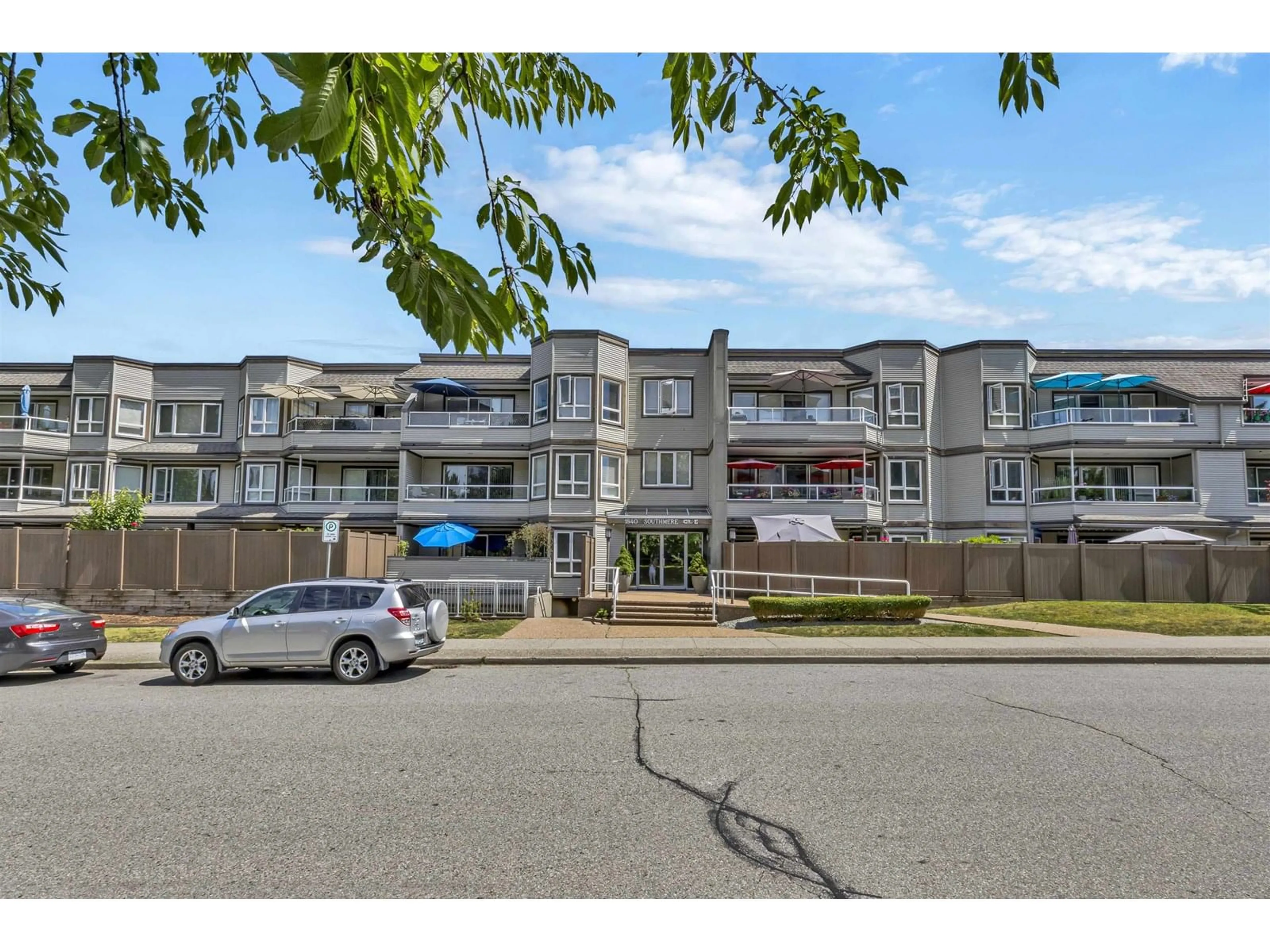 A pic from outside/outdoor area/front of a property/back of a property/a pic from drone, mountain view for 205 - 1840 SOUTHMERE EAST, Surrey British Columbia V4A9C5