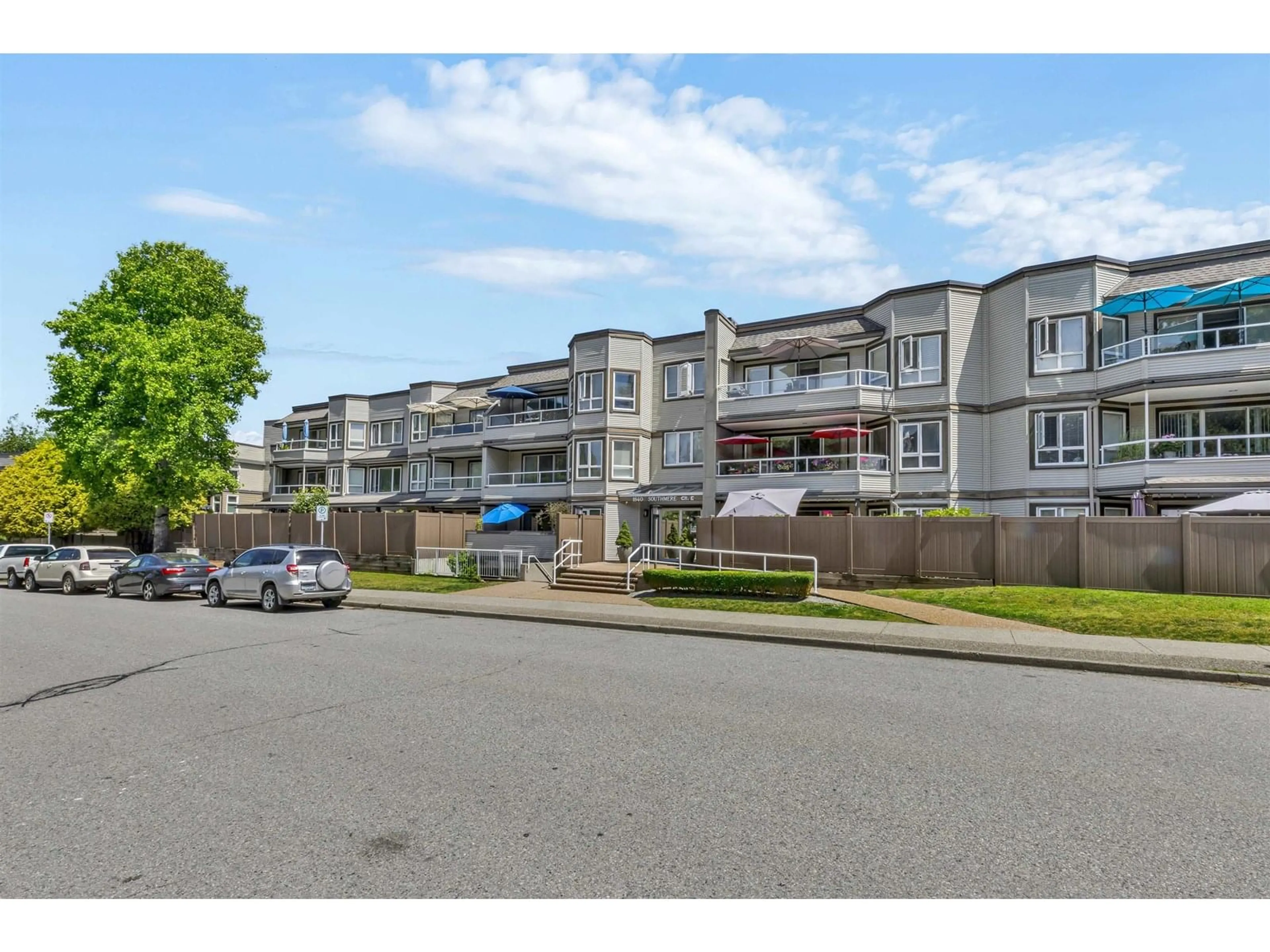 A pic from outside/outdoor area/front of a property/back of a property/a pic from drone, street for 205 - 1840 SOUTHMERE EAST, Surrey British Columbia V4A9C5