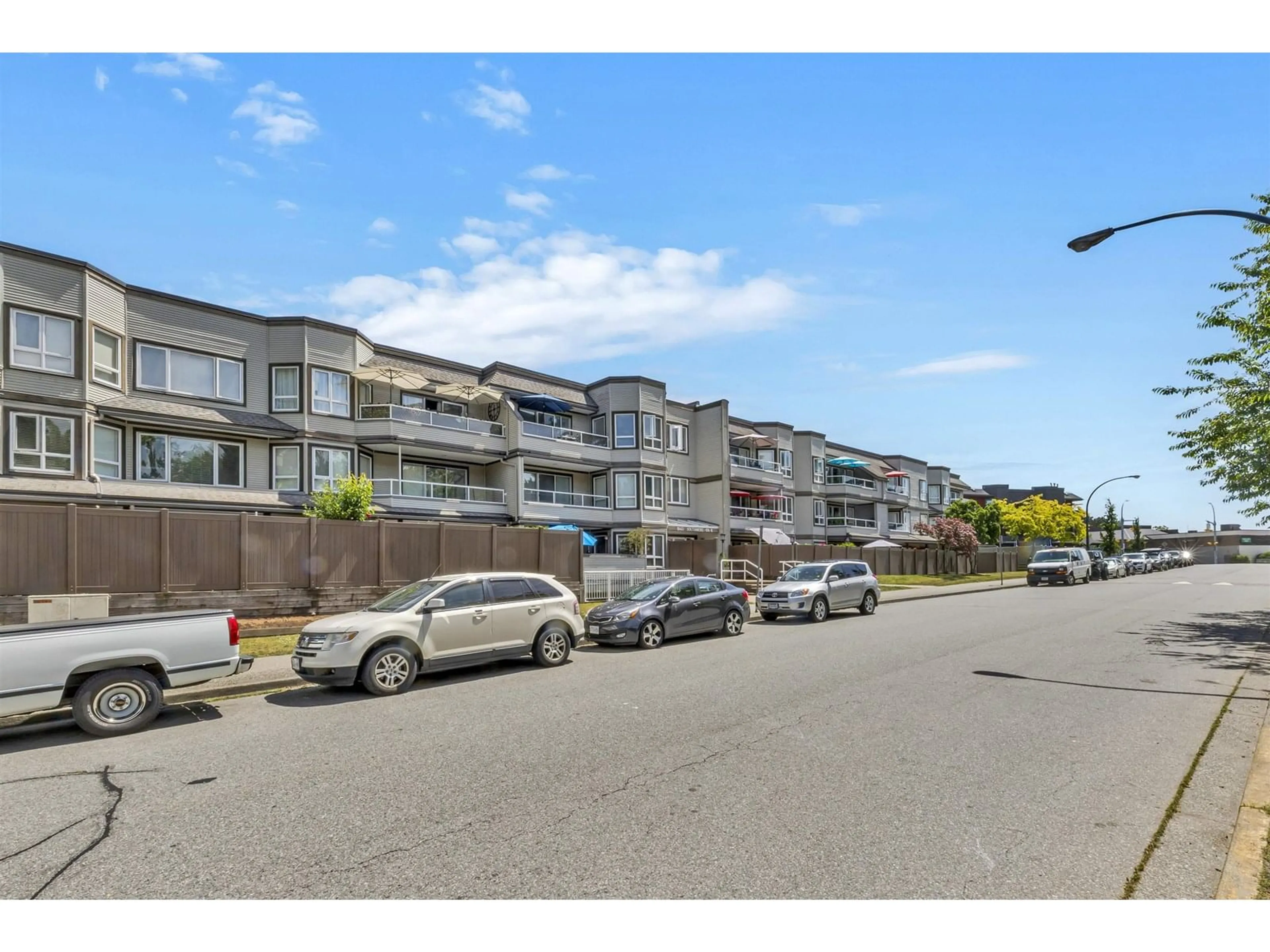 A pic from outside/outdoor area/front of a property/back of a property/a pic from drone, street for 205 - 1840 SOUTHMERE EAST, Surrey British Columbia V4A9C5