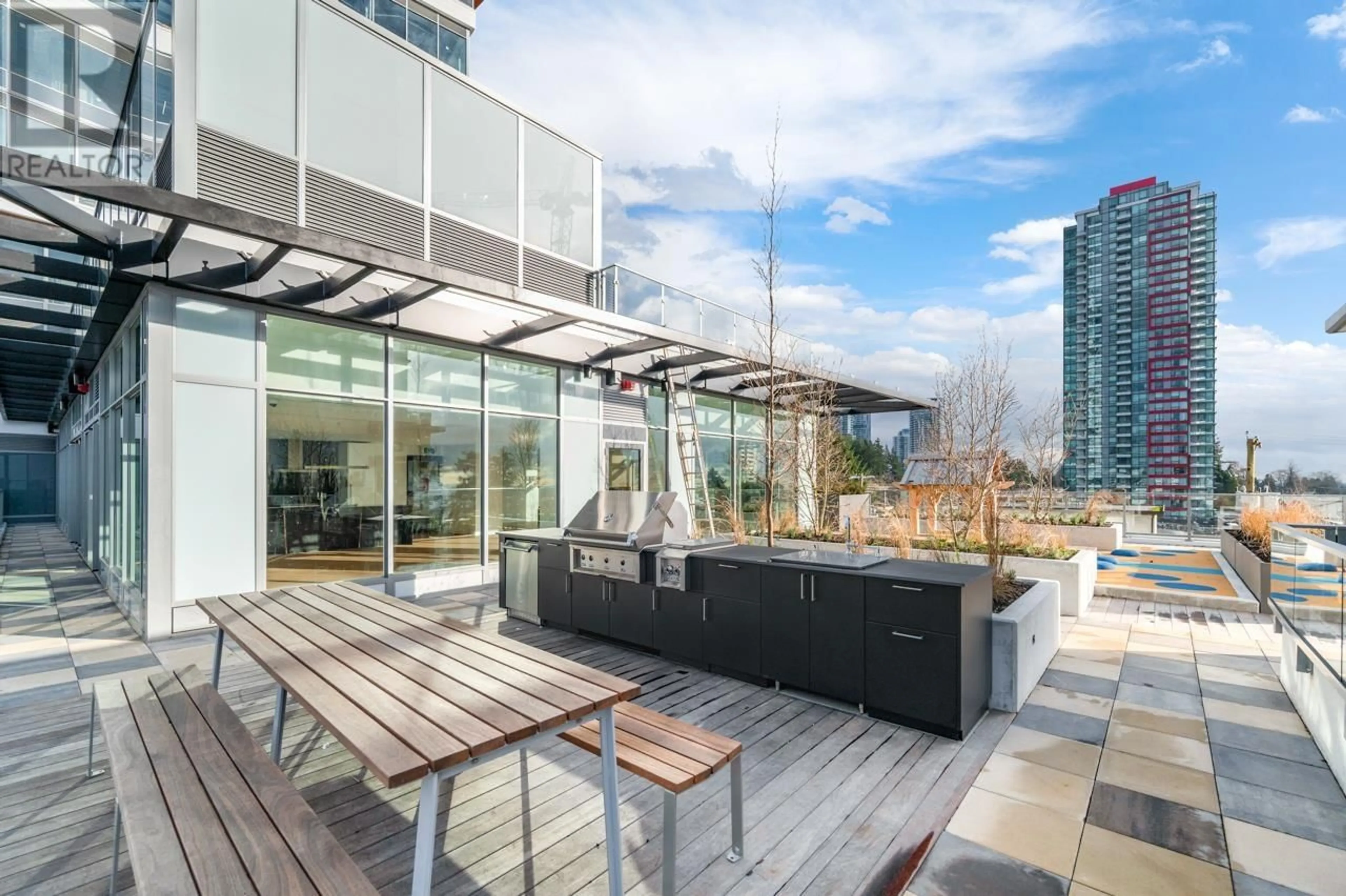 Patio, city buildings view from balcony for 1303 - 6511 SUSSEX AVENUE, Burnaby British Columbia V5H0K5