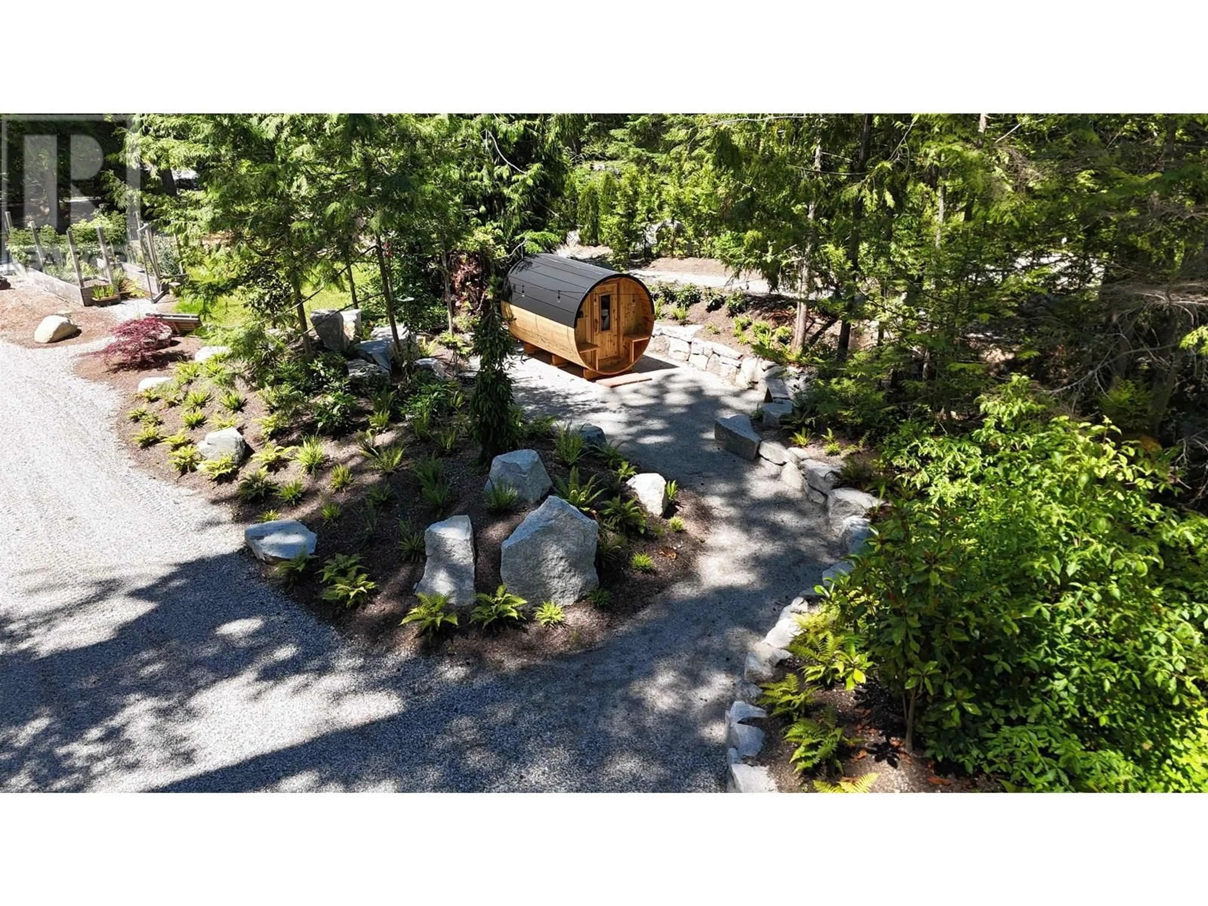 A pic from outside/outdoor area/front of a property/back of a property/a pic from drone, forest/trees view for 6290 SECHELT INLET ROAD, Sechelt British Columbia V7Z0L3