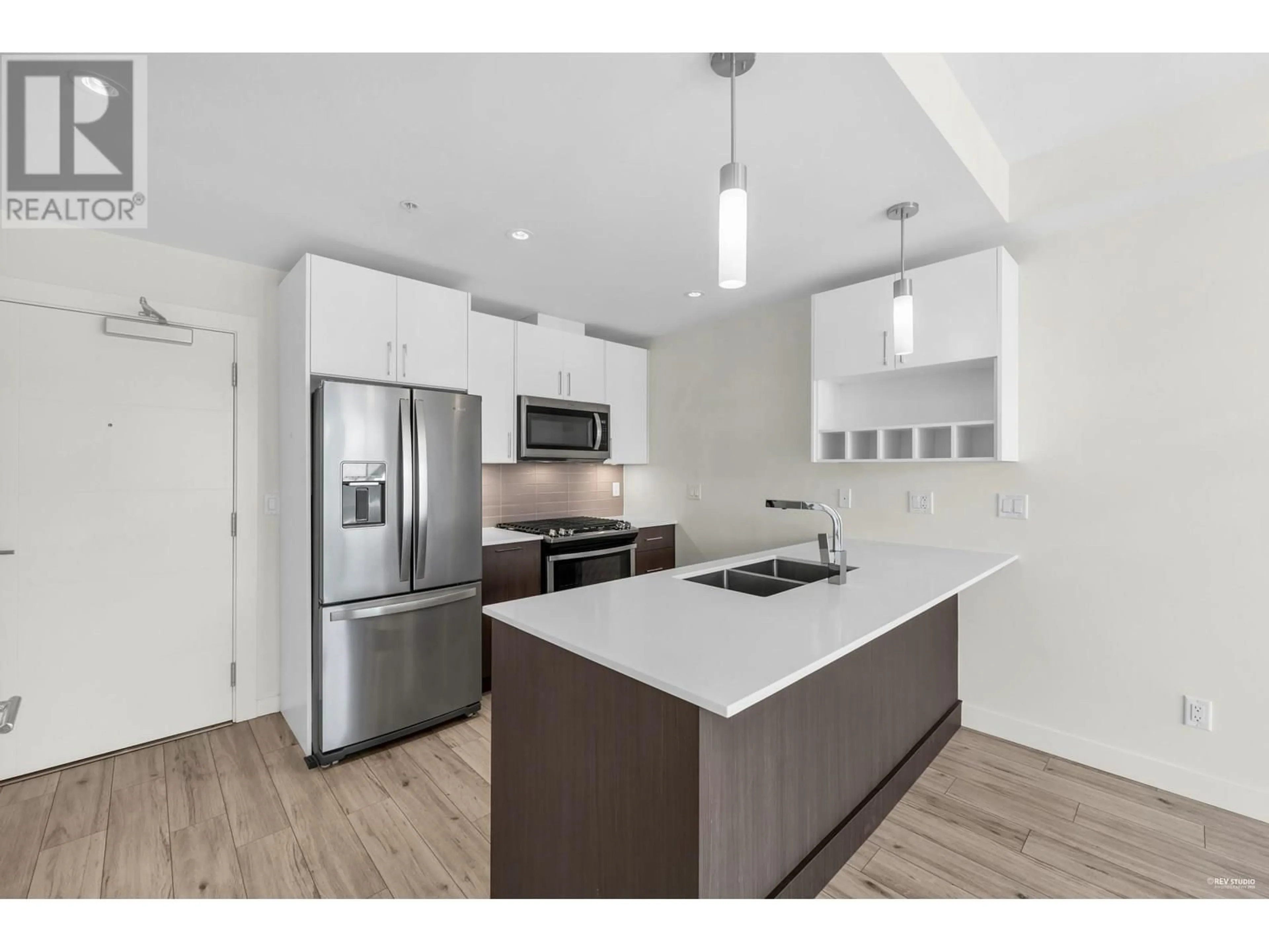 Open concept kitchen, unknown for 312 - 13040 NO. 2 ROAD, Richmond British Columbia V7E0C4