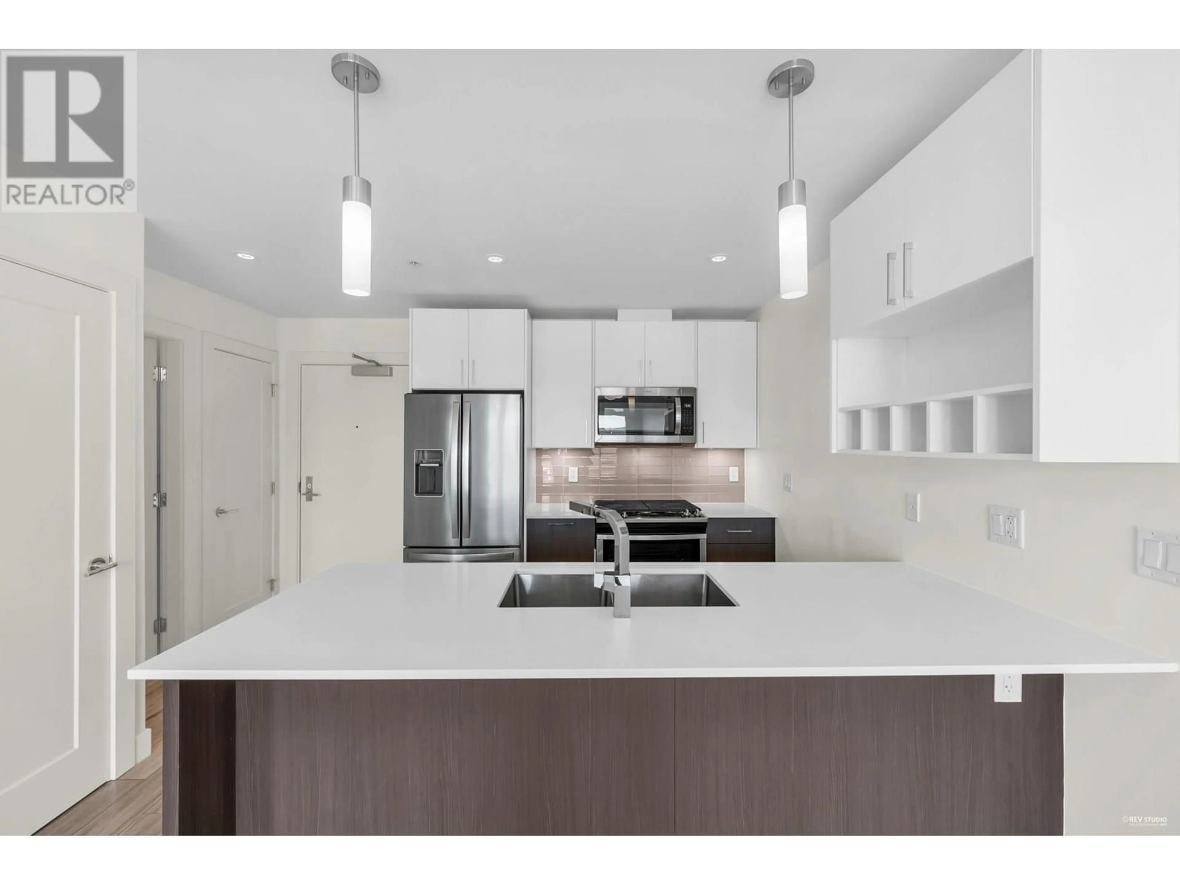 Open concept kitchen, unknown for 312 - 13040 NO. 2 ROAD, Richmond British Columbia V7E0C4
