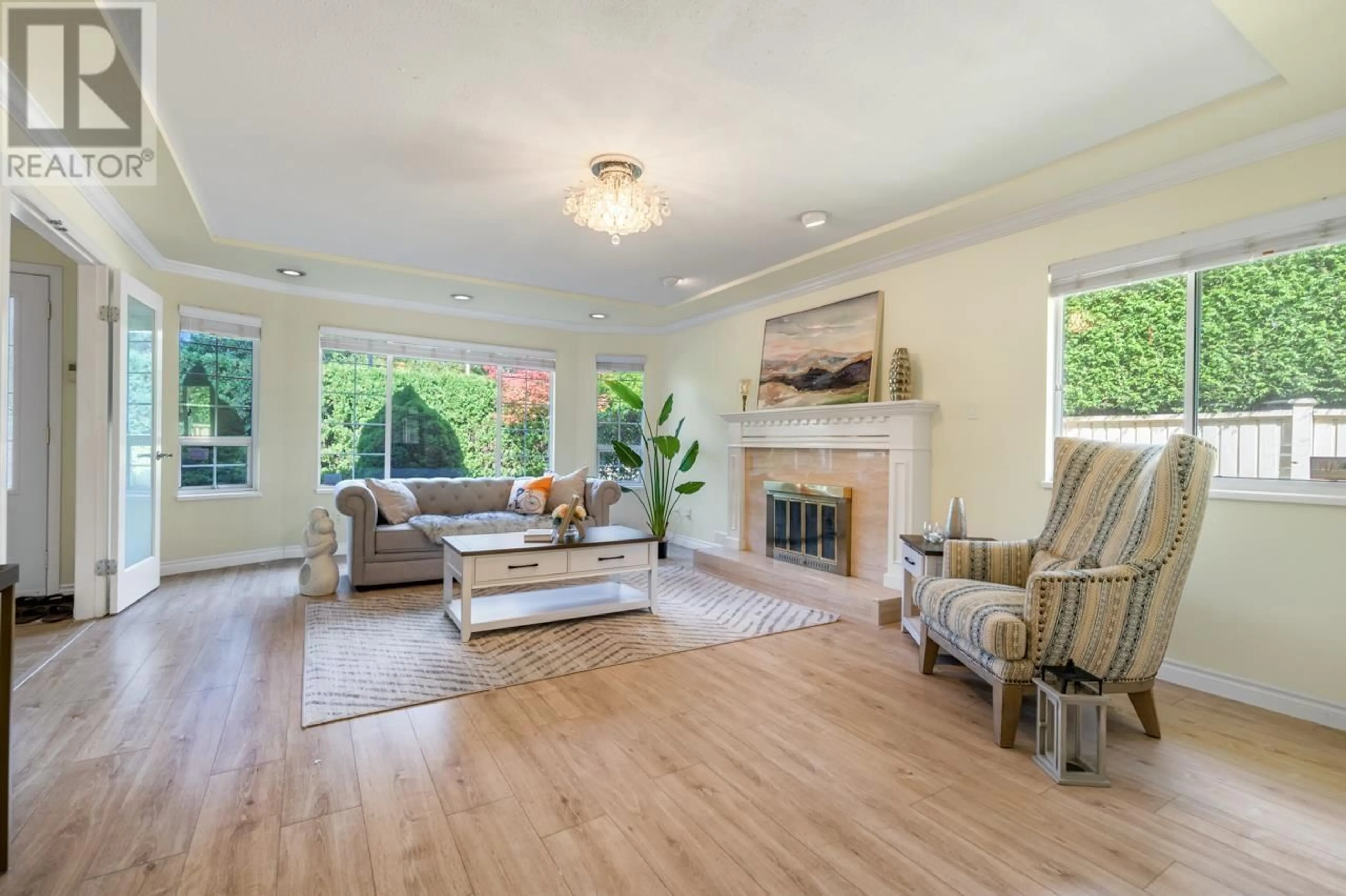 Living room with furniture, wood/laminate floor for 6788 CHATTERTON ROAD, Richmond British Columbia V7C2Y7