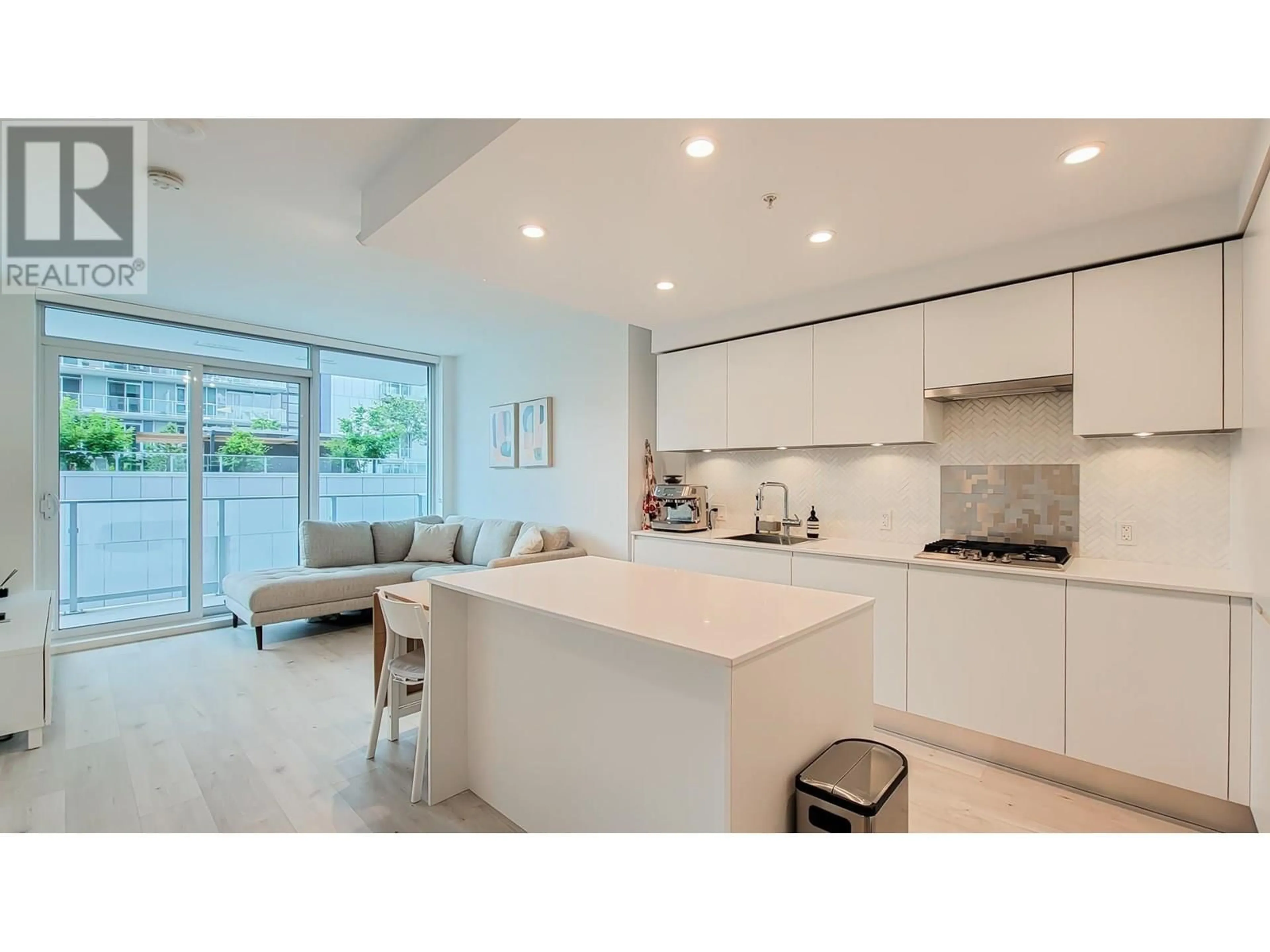 Open concept kitchen, ceramic/tile floor for 711 - 3833 EVERGREEN PLACE, Burnaby British Columbia V3J0M2