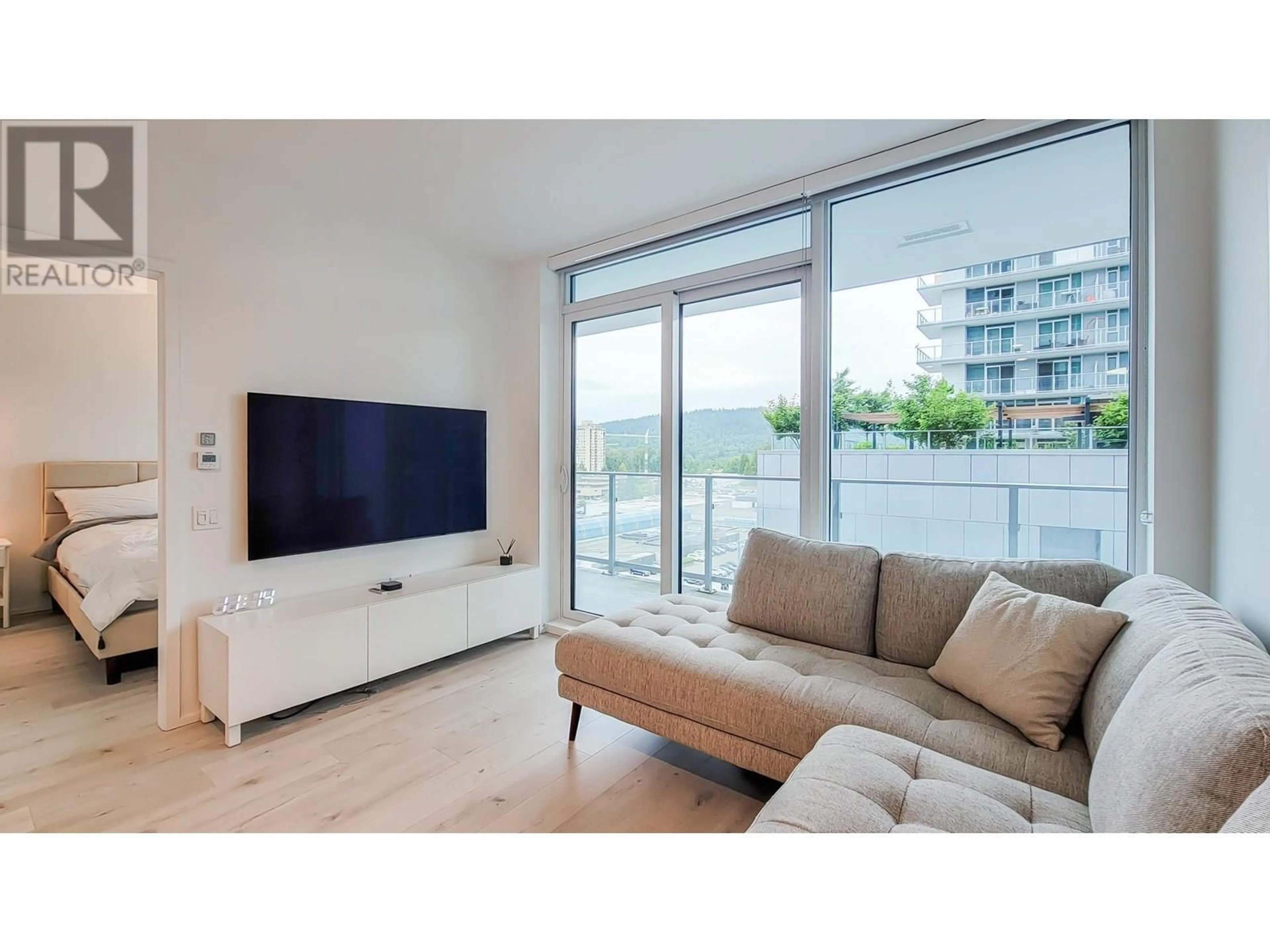 Living room with furniture, unknown for 711 - 3833 EVERGREEN PLACE, Burnaby British Columbia V3J0M2