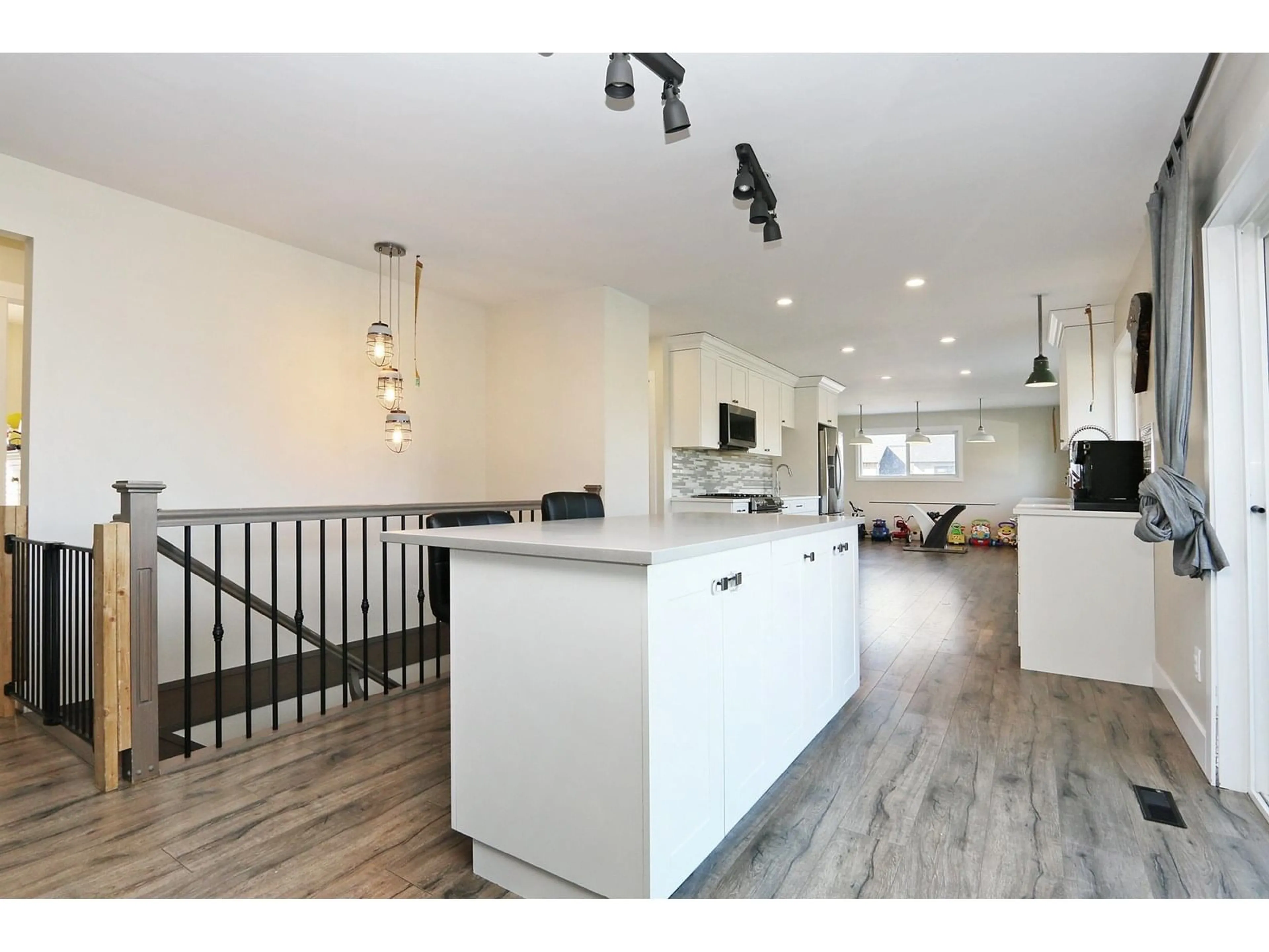 Open concept kitchen, wood/laminate floor for 8875 PREST ROAD, Chilliwack British Columbia V2P8E1