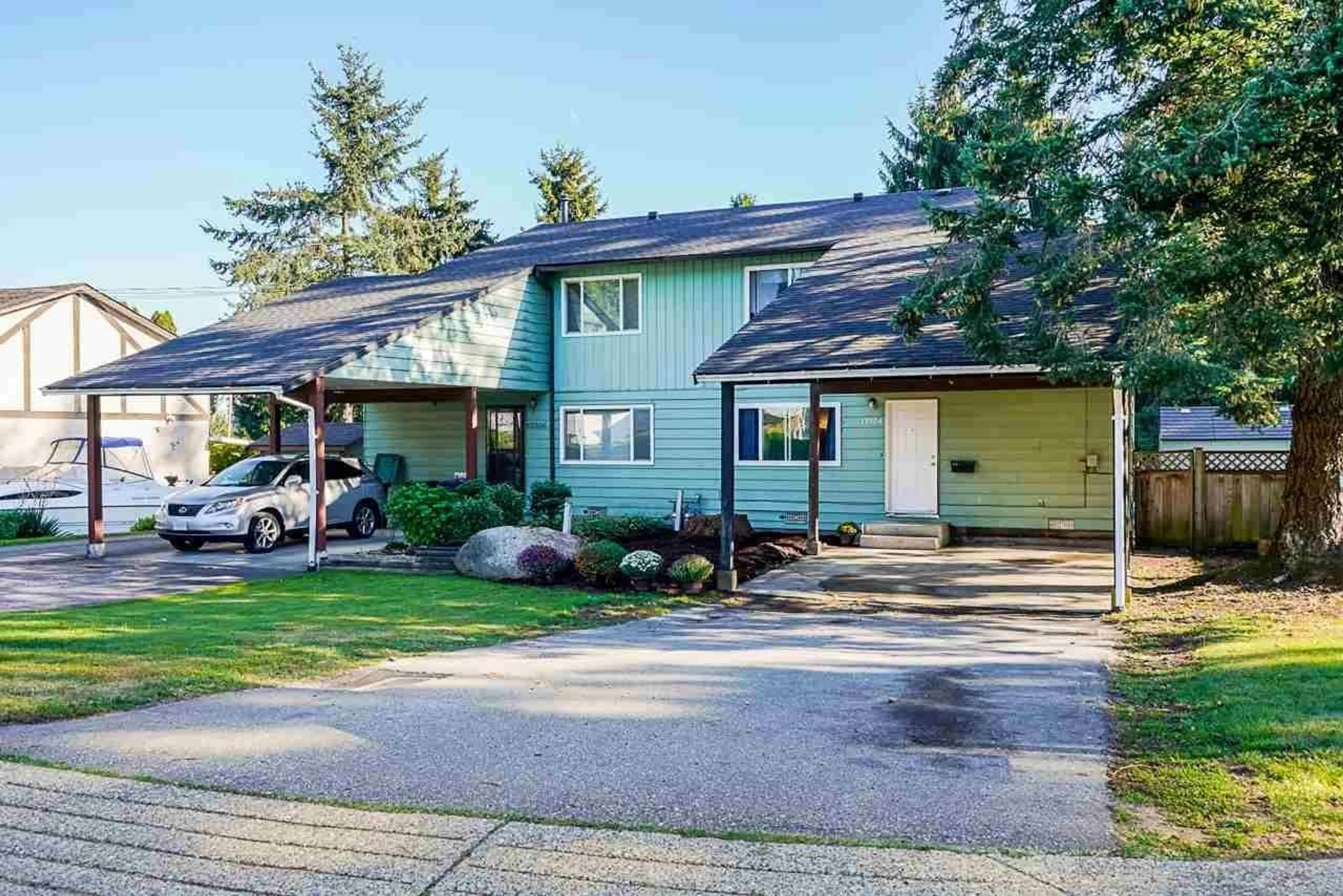 Home with vinyl exterior material, street for 13304 100, Surrey British Columbia V3T1H5