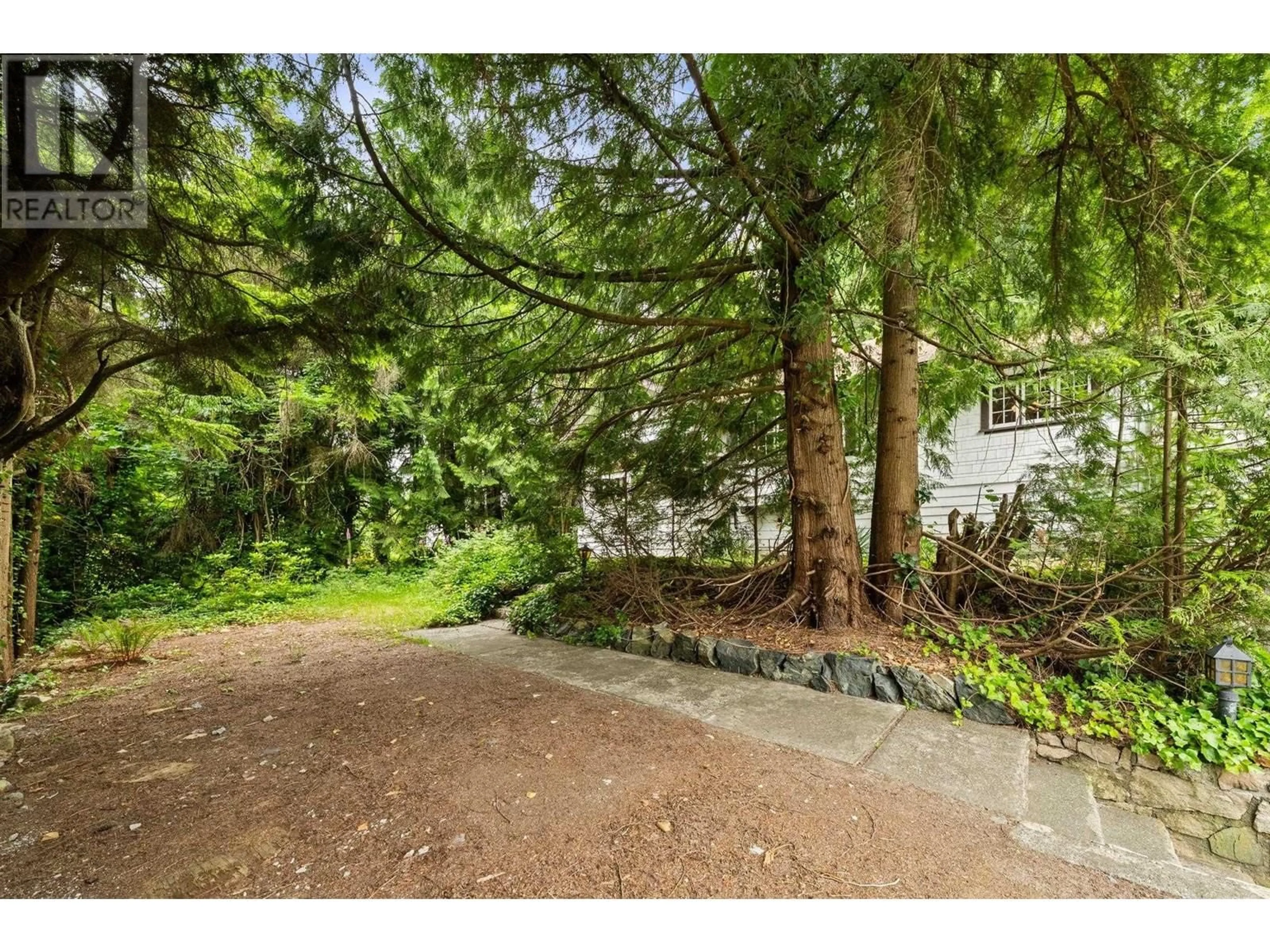 A pic from outside/outdoor area/front of a property/back of a property/a pic from drone, forest/trees view for 338 OSBORNE ROAD, North Vancouver British Columbia V7N1M3