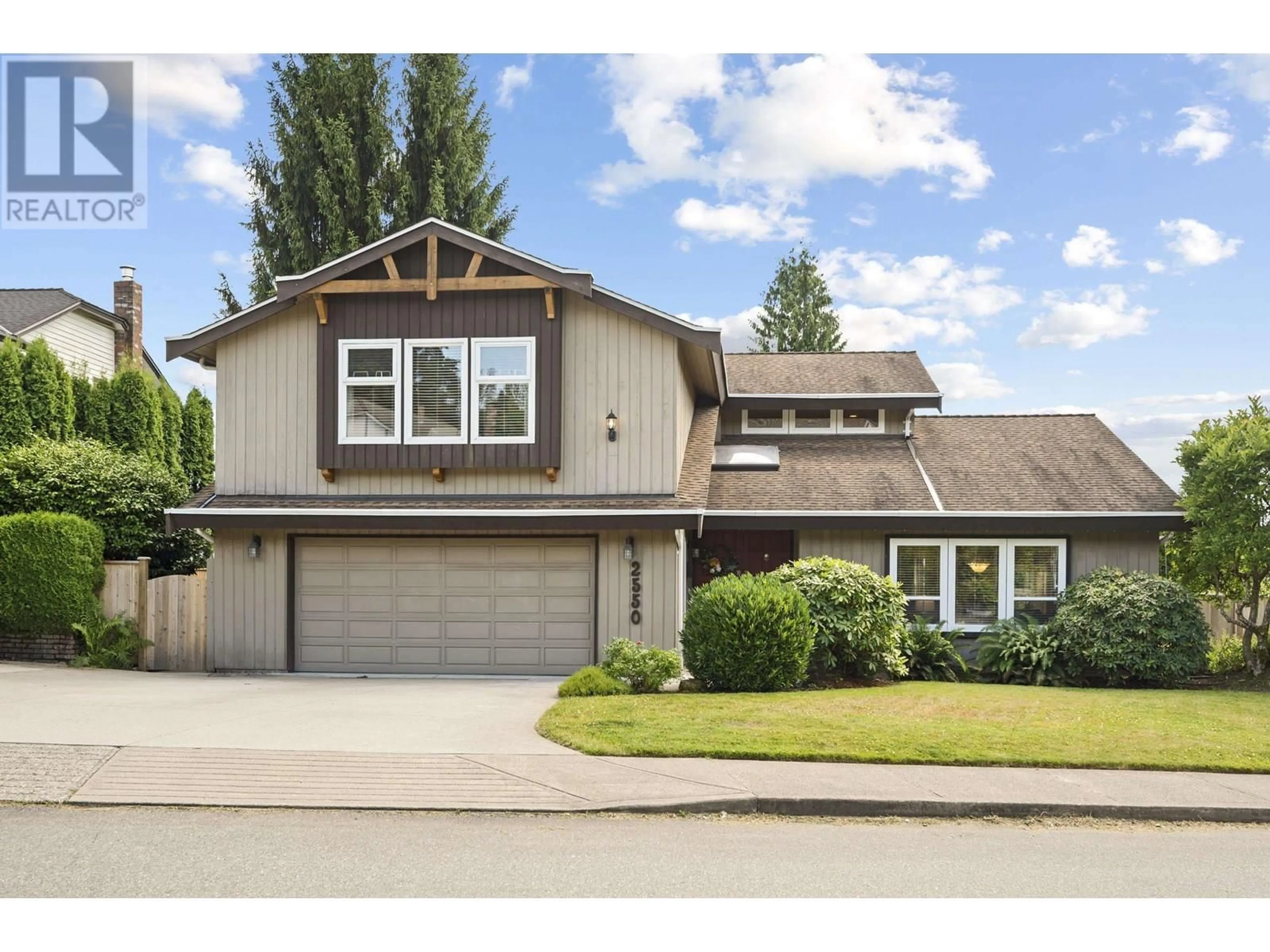 Home with vinyl exterior material, street for 2550 BLUEBELL AVENUE, Coquitlam British Columbia V3E2G1