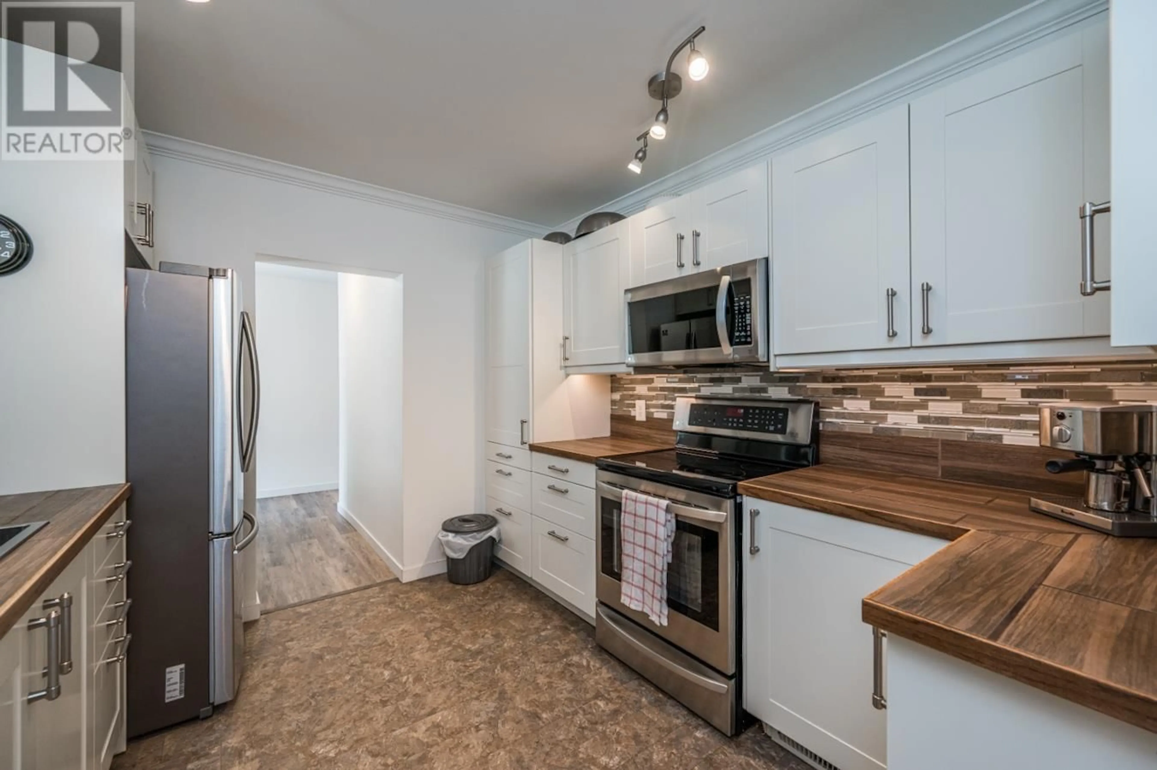 Standard kitchen, wood/laminate floor for 2389 MYTTING ROAD, Prince George British Columbia V2K1R6