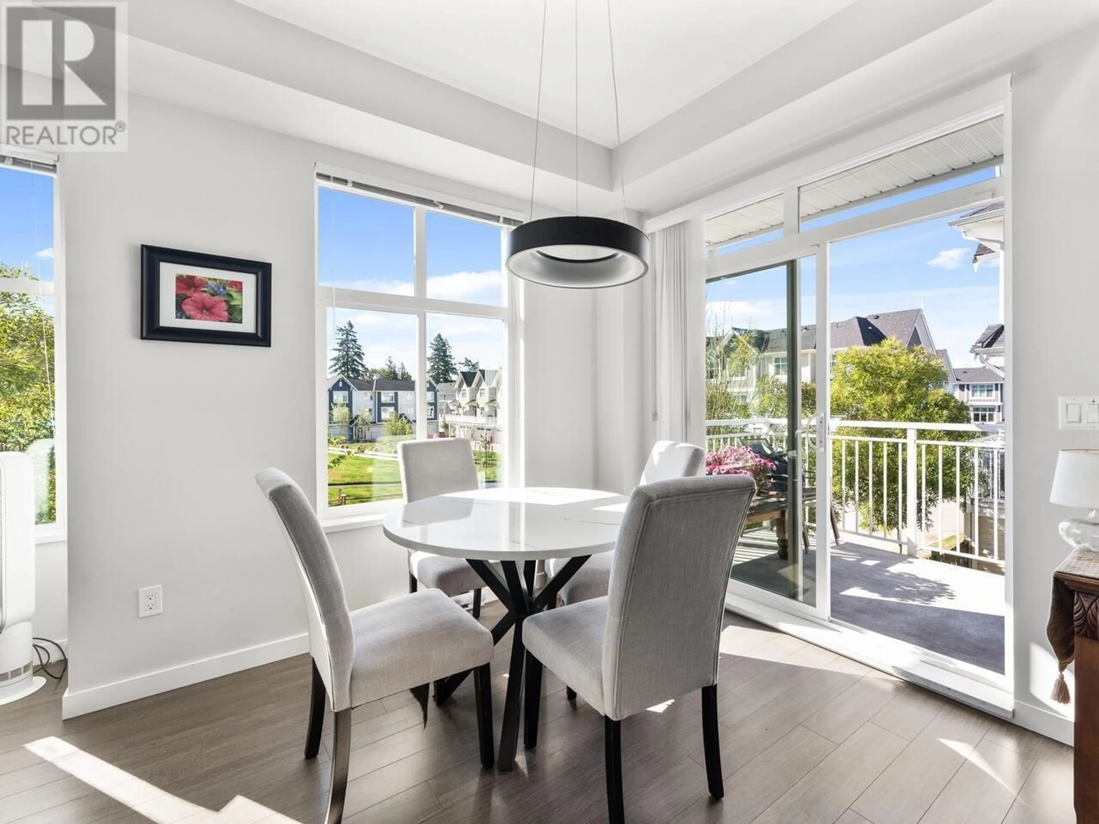 Dining room, wood/laminate floor for 1501 - 11295 PAZARENA PLACE, Maple Ridge British Columbia V2X4K9